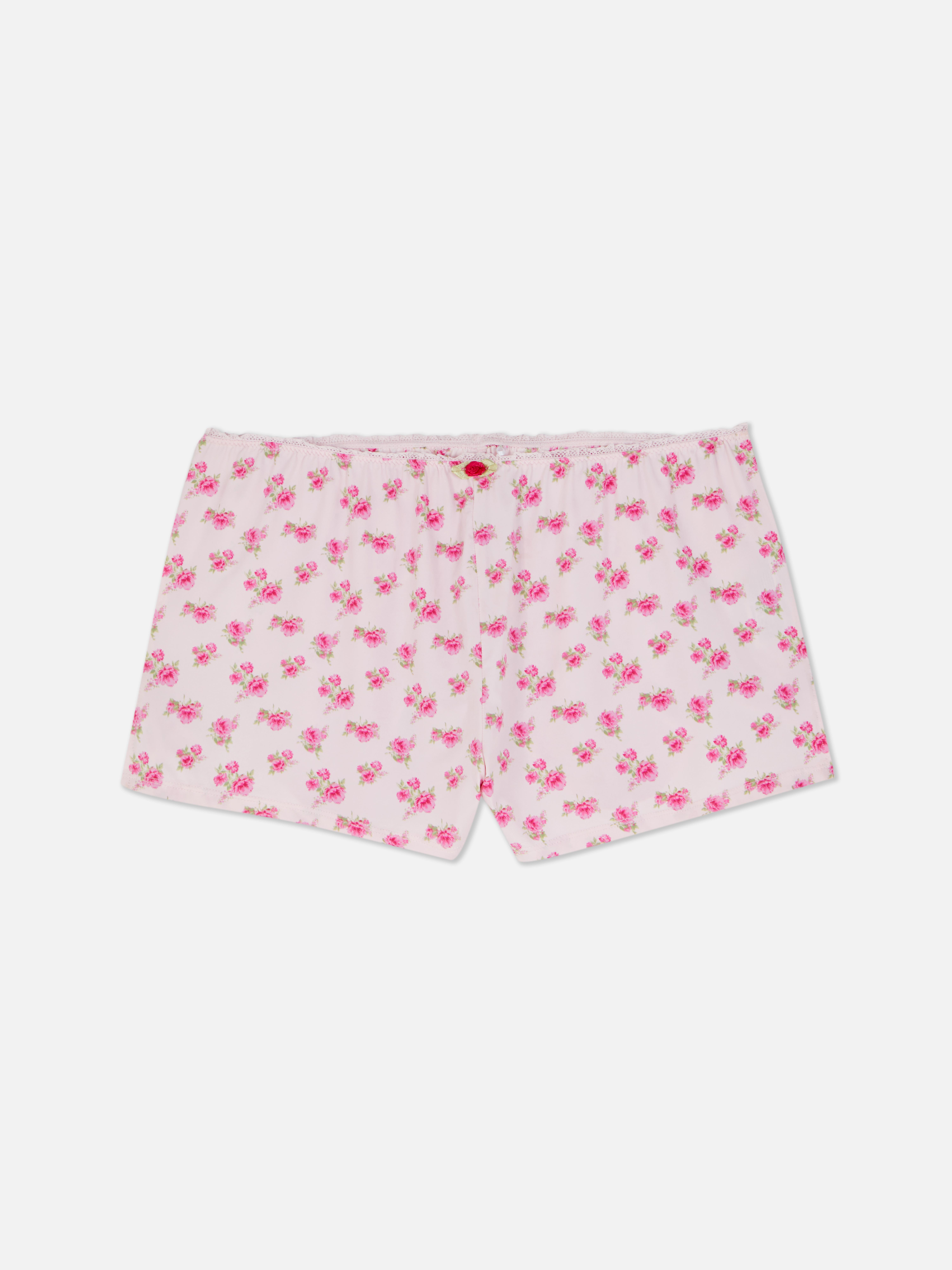 Pantaloni scurți de pijama cu bordură din dantelă. Pantaloni scurți de pijama cu bordură din dantelă și detalii florale.