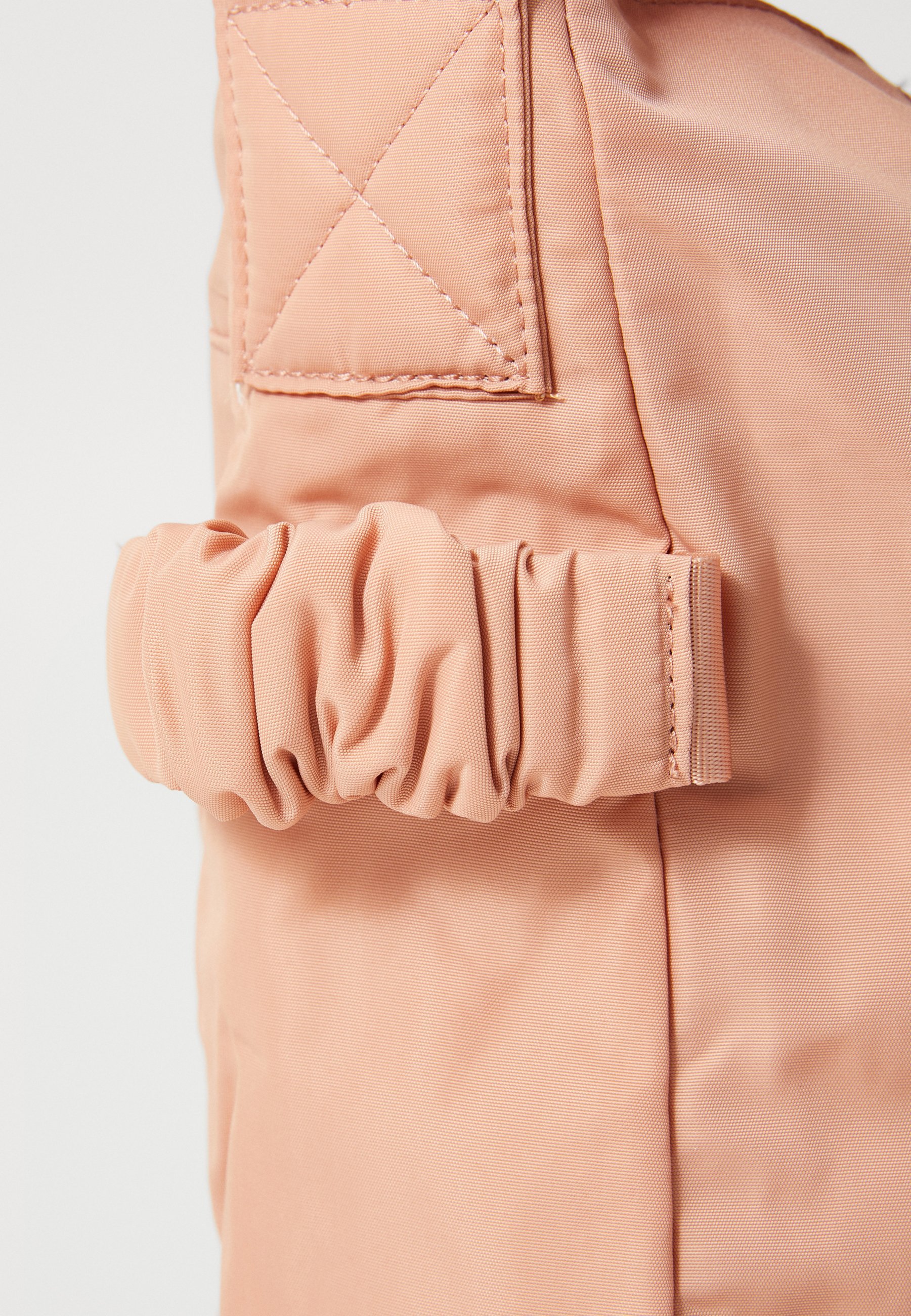 Nike Performance schoudertas - roségoudkleurig