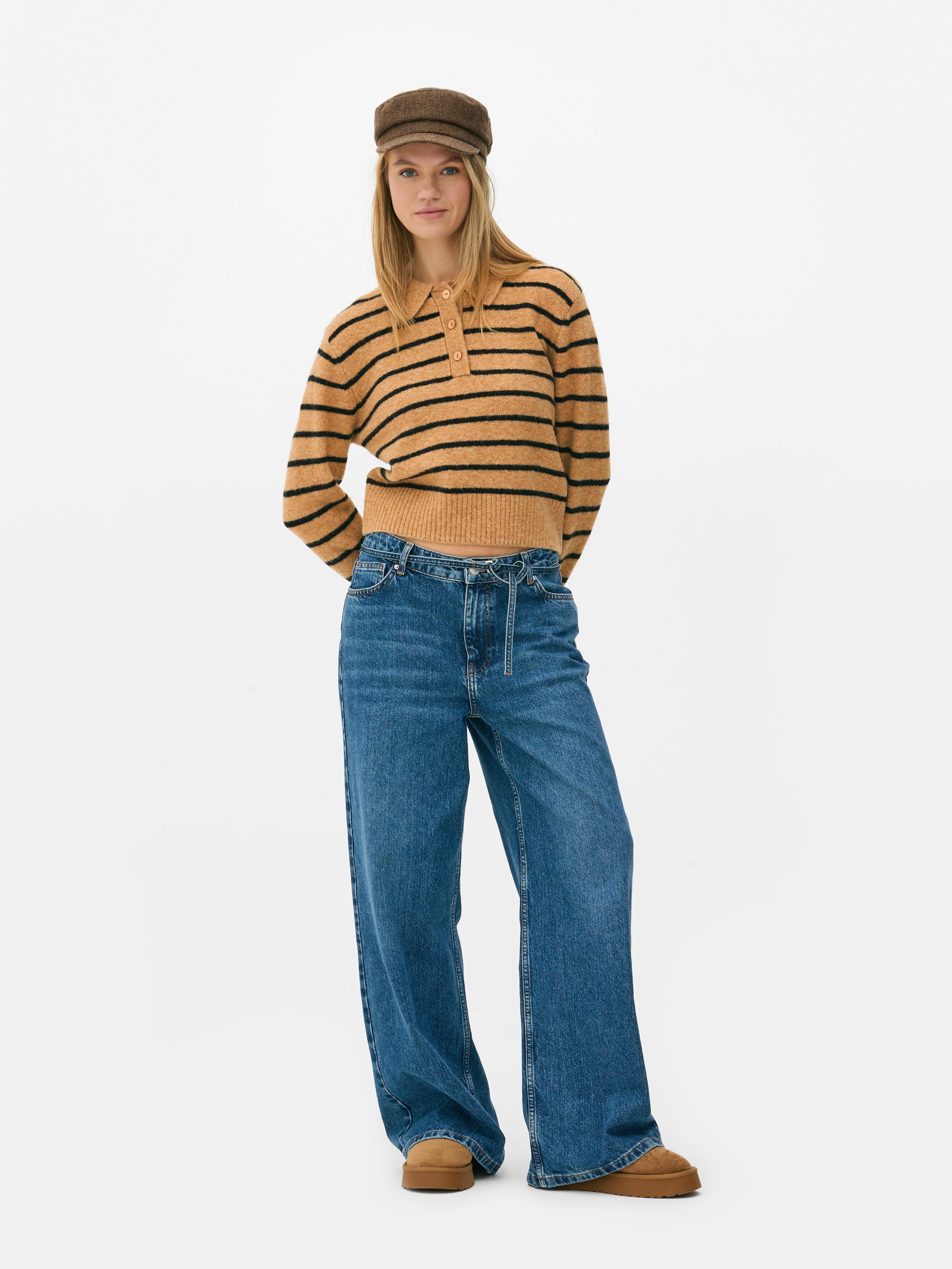 Genser med polokrage En myk genser med polokrage og knappestolpe for et komfortabelt, preppy utseende