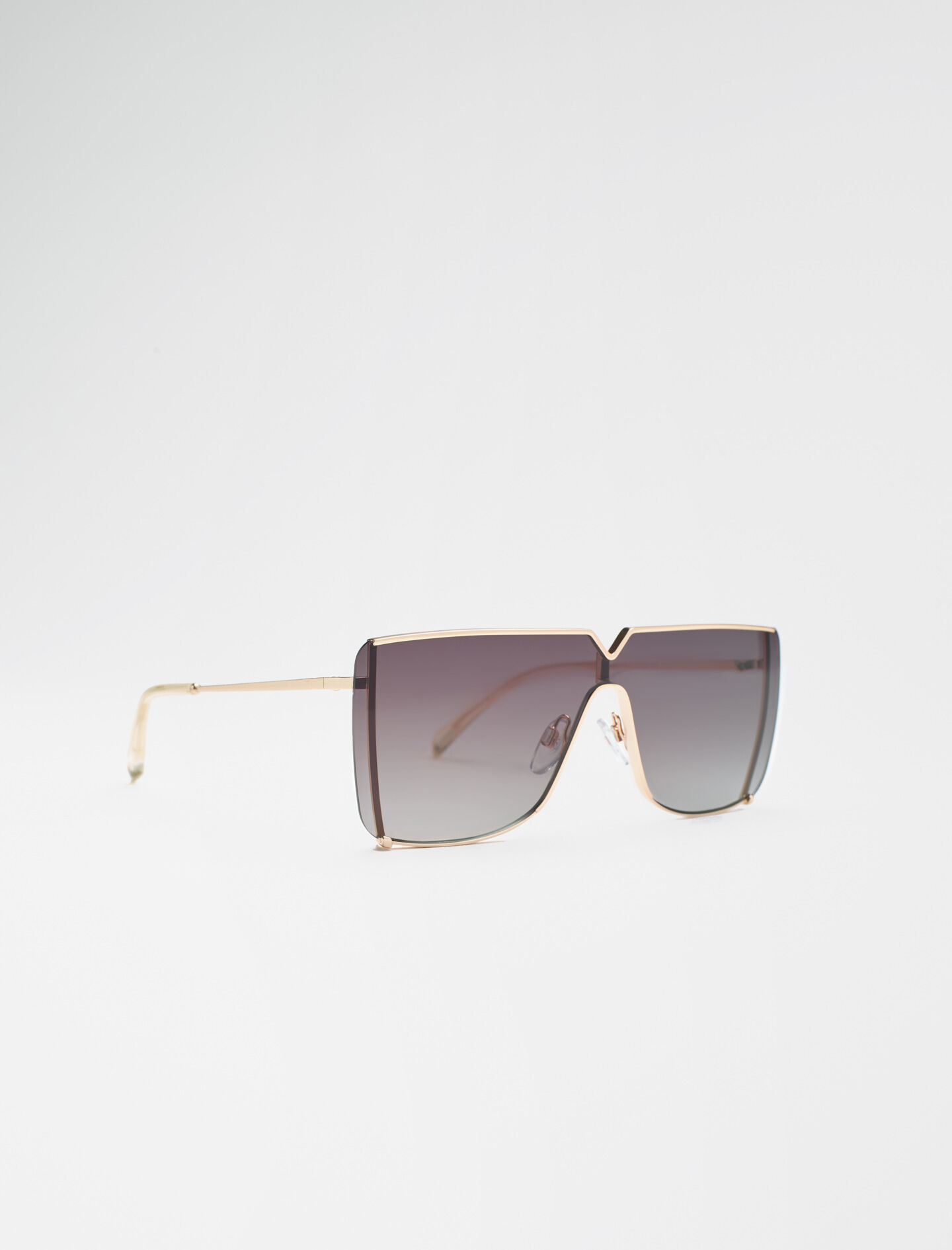 Oversized gouden zonnebril - Kristalgeel