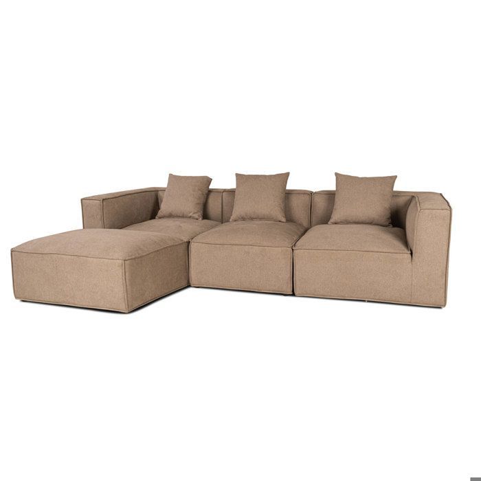 Sofabox met chaise longue en 3 sierkussens in beige en bruin.