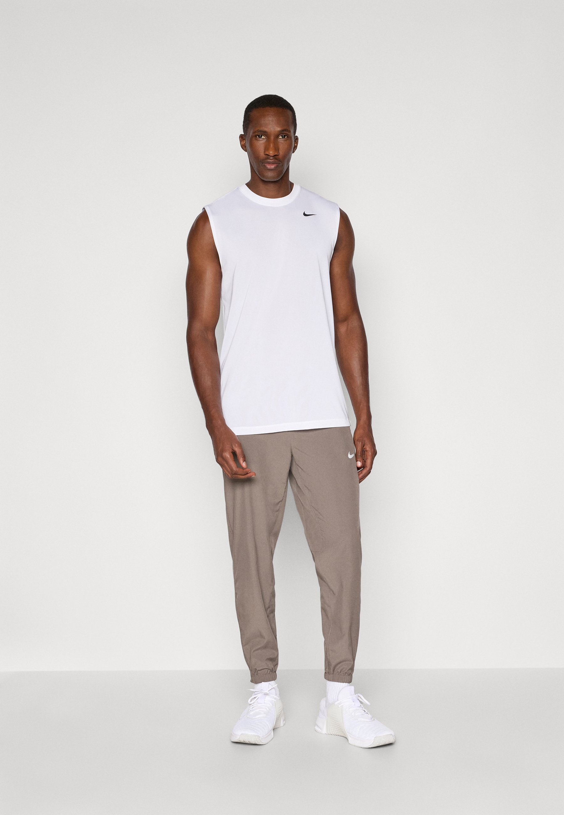 Pantaloni da tuta Nike Performance FORM PANT - colore pietra/nero/argento riflettente