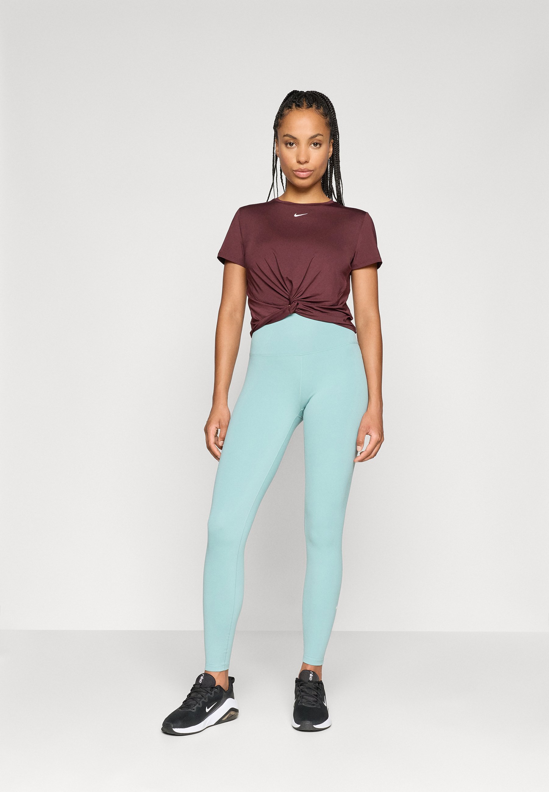 Leggings de performance Nike - canon/blanc