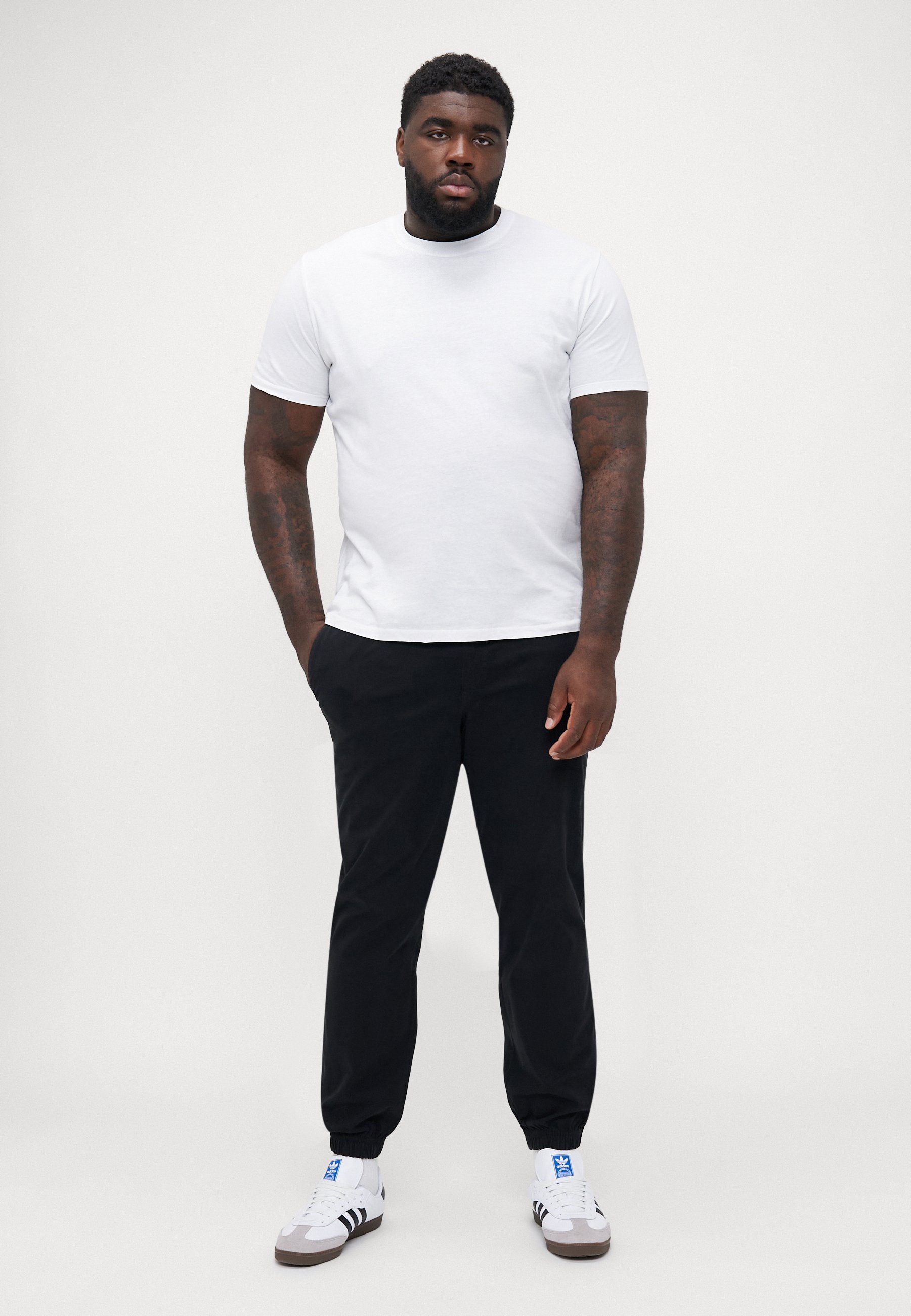Pantaloni da tuta Jack & Jones JPSTKANE TROY con risvolto - neri