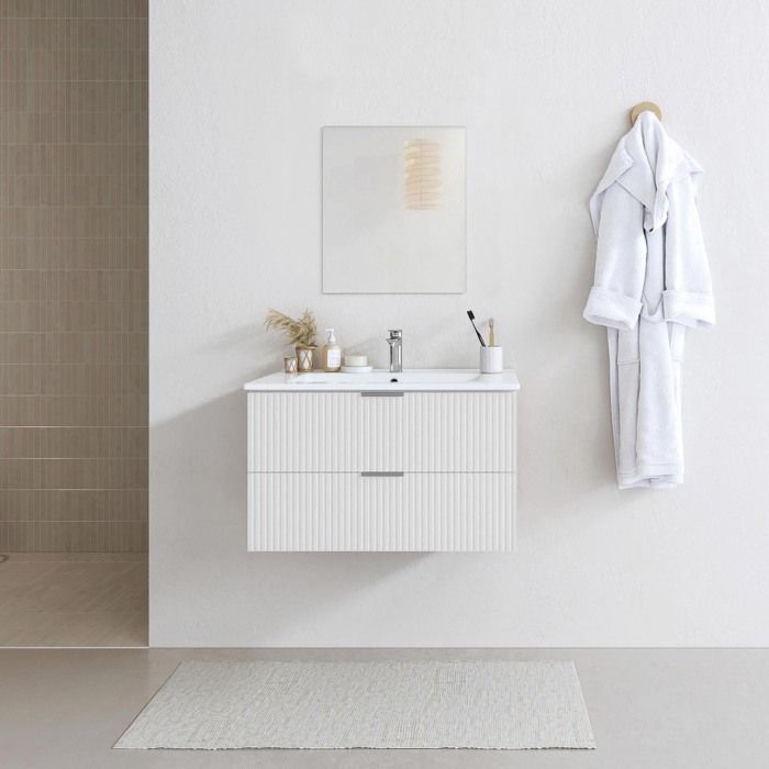 Mueble de baño con lavabo individual de 60 cm, fabricado en MDF corrugado blanco.