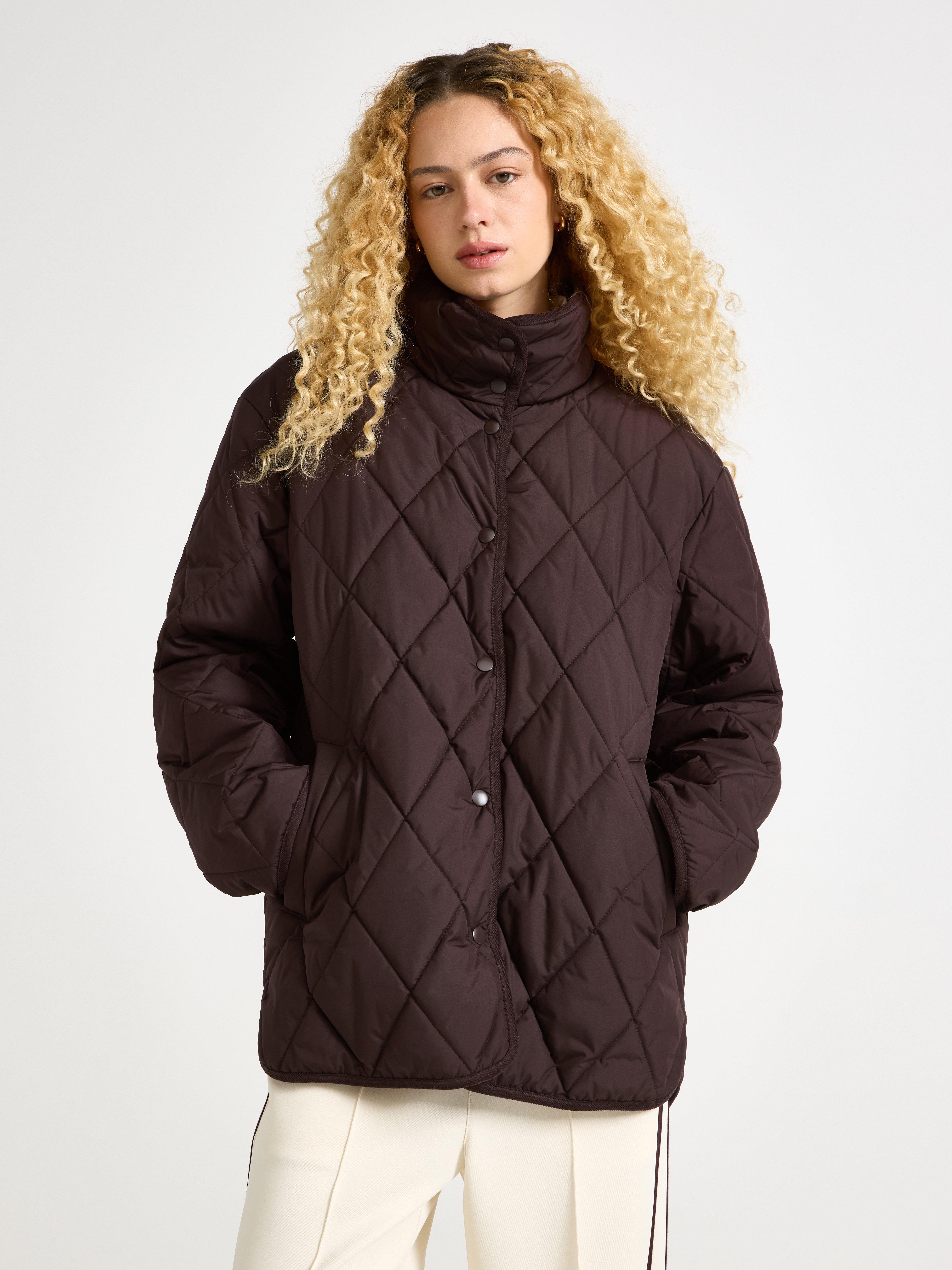 Vattenavvisande quiltad jacka Dark Dusty Red