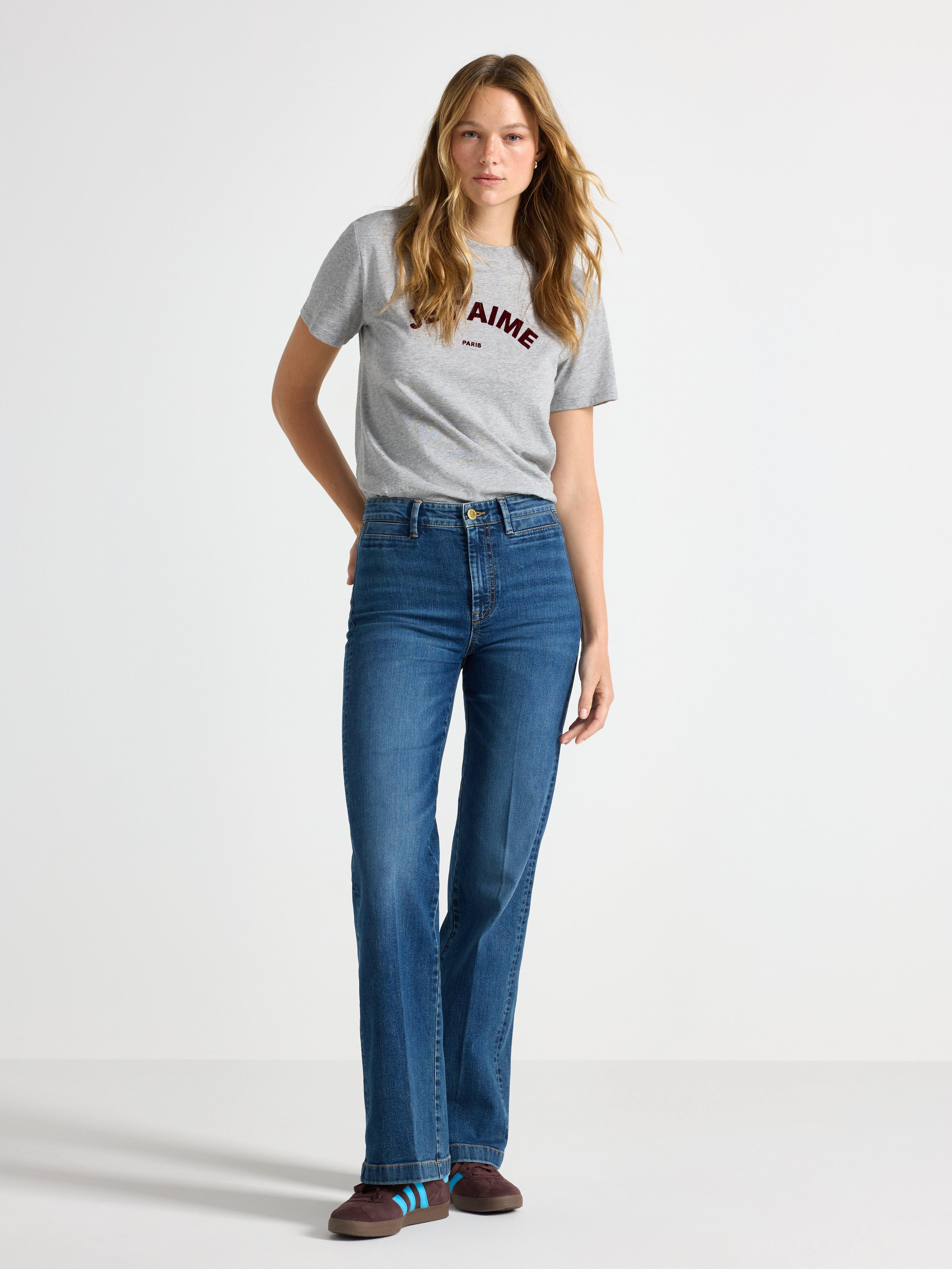 Vaqueros elásticos de pierna ancha, denim medio.