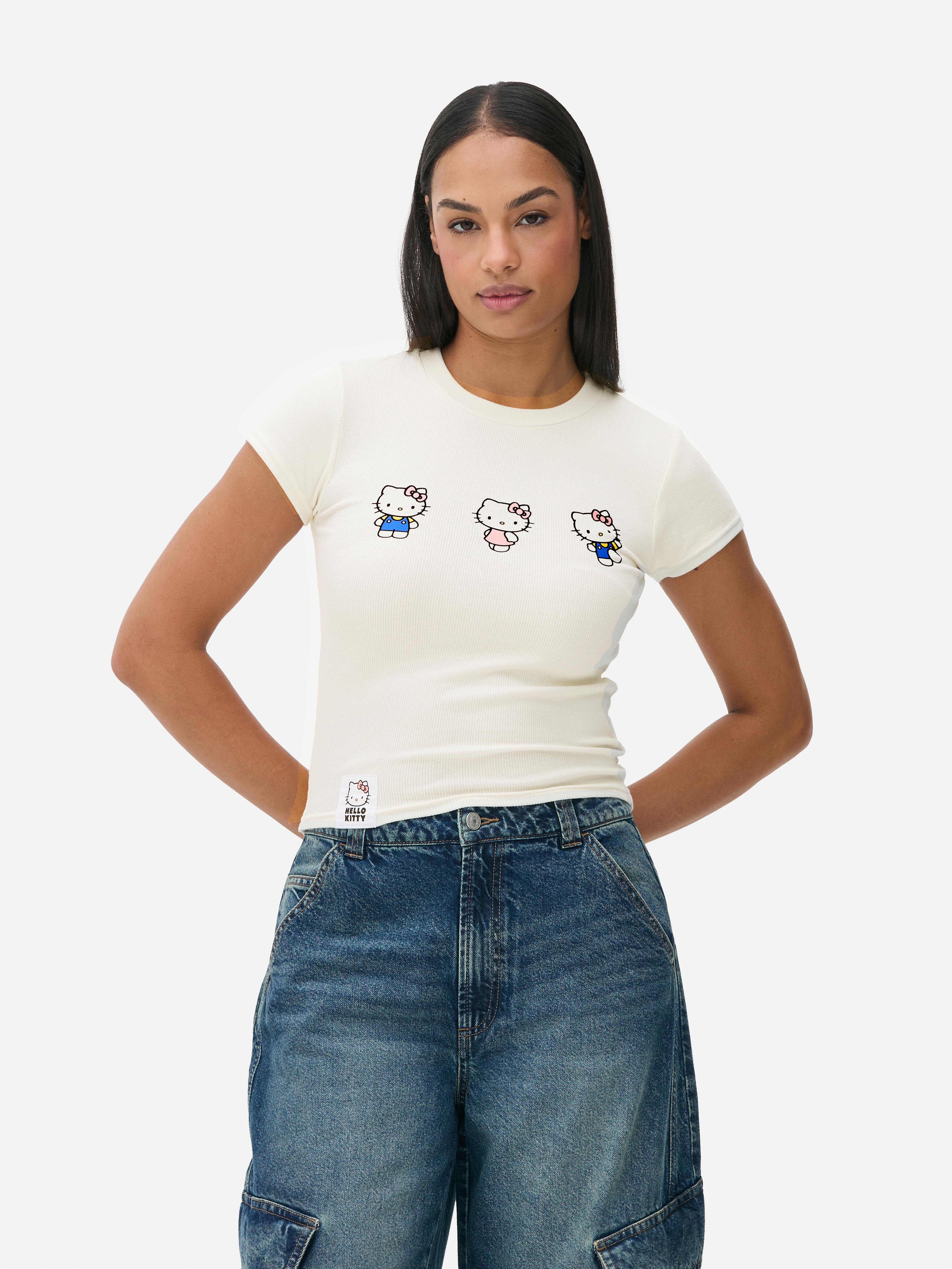 Tricou cu nervuri Hello Kitty Un tricou cu nervuri cu trei imagini cu Hello Kitty