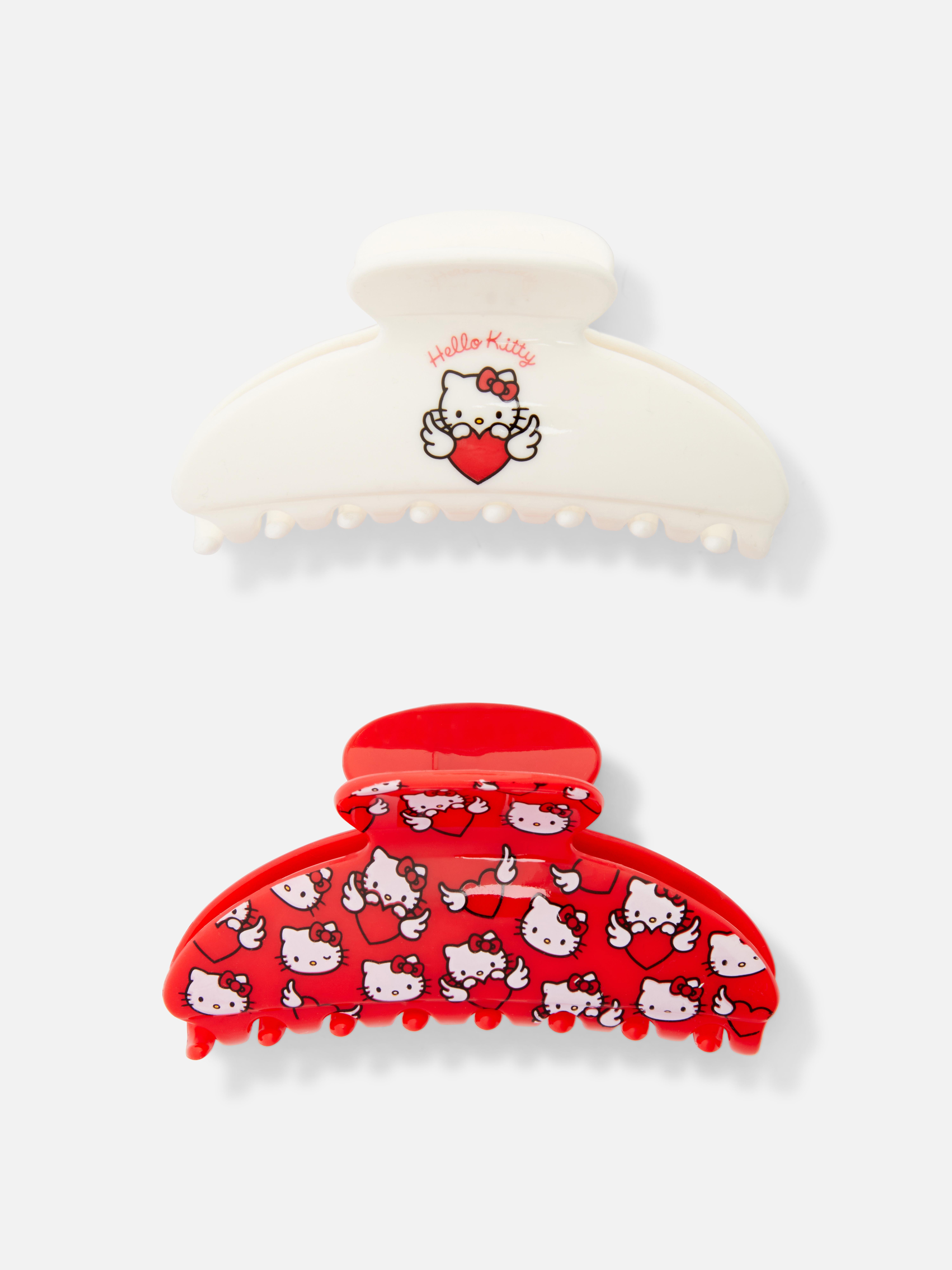 Agrafe de păr Hello Kitty, set de 2. Două agrafe de păr cu un design Hello Kitty? Da, vă rog.
