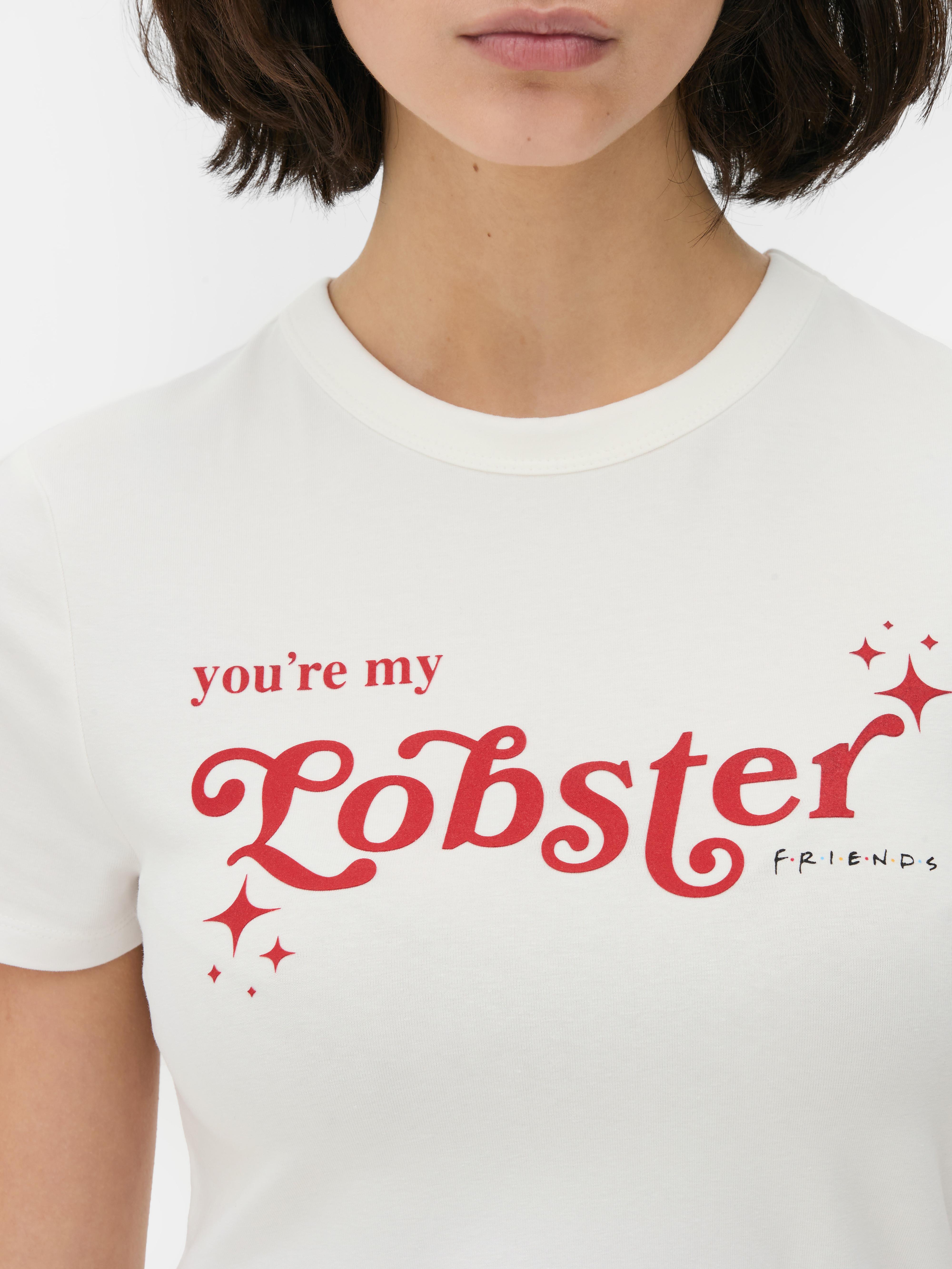 Tricou pentru bebeluși cu citatul Lobster Friends Un tricou pentru bebeluși cu un imprimeu cu tematică Friends pe față