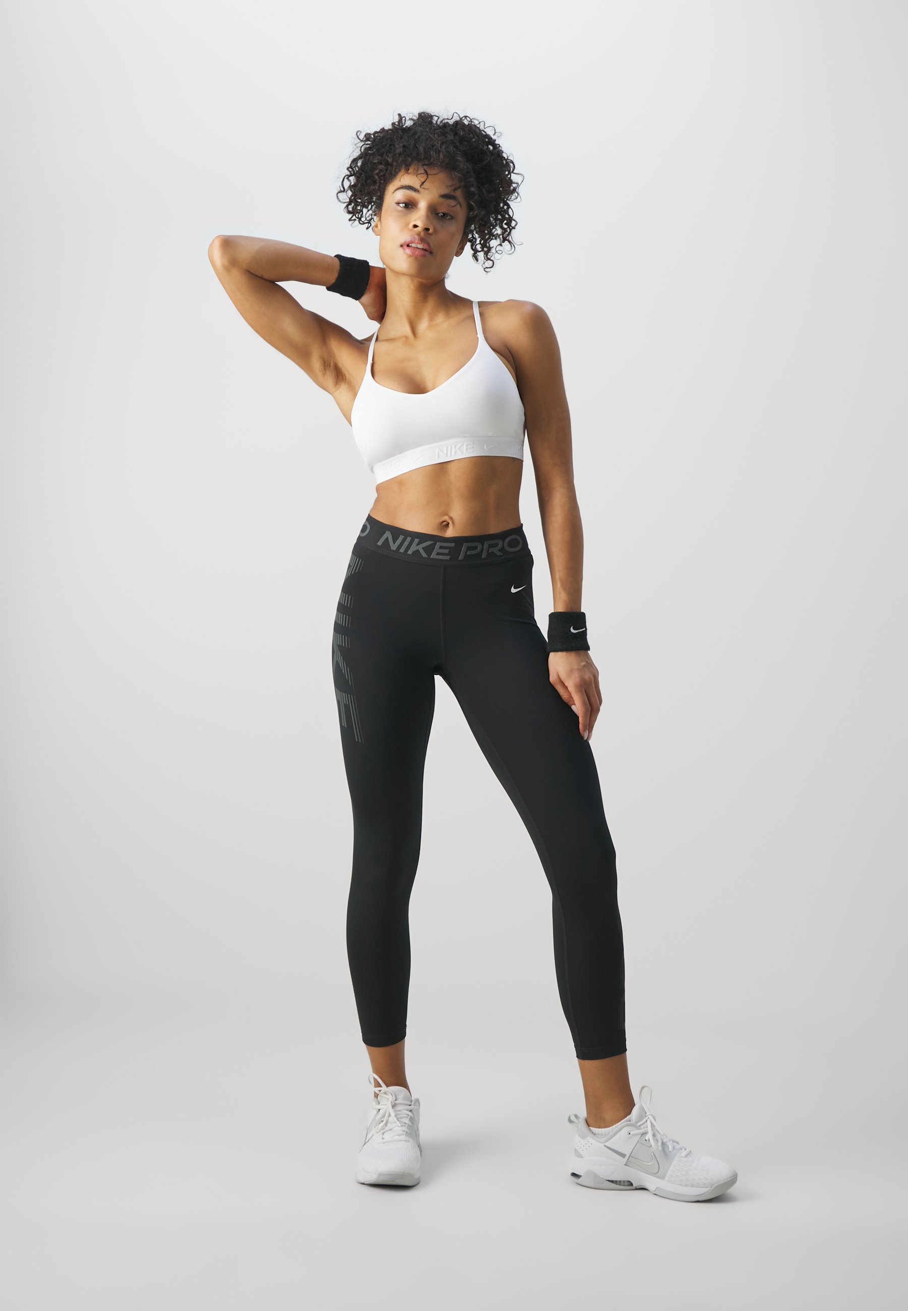 Soutien-gorge de sport Nike Performance INDY BRA - Maintien léger - Blanc