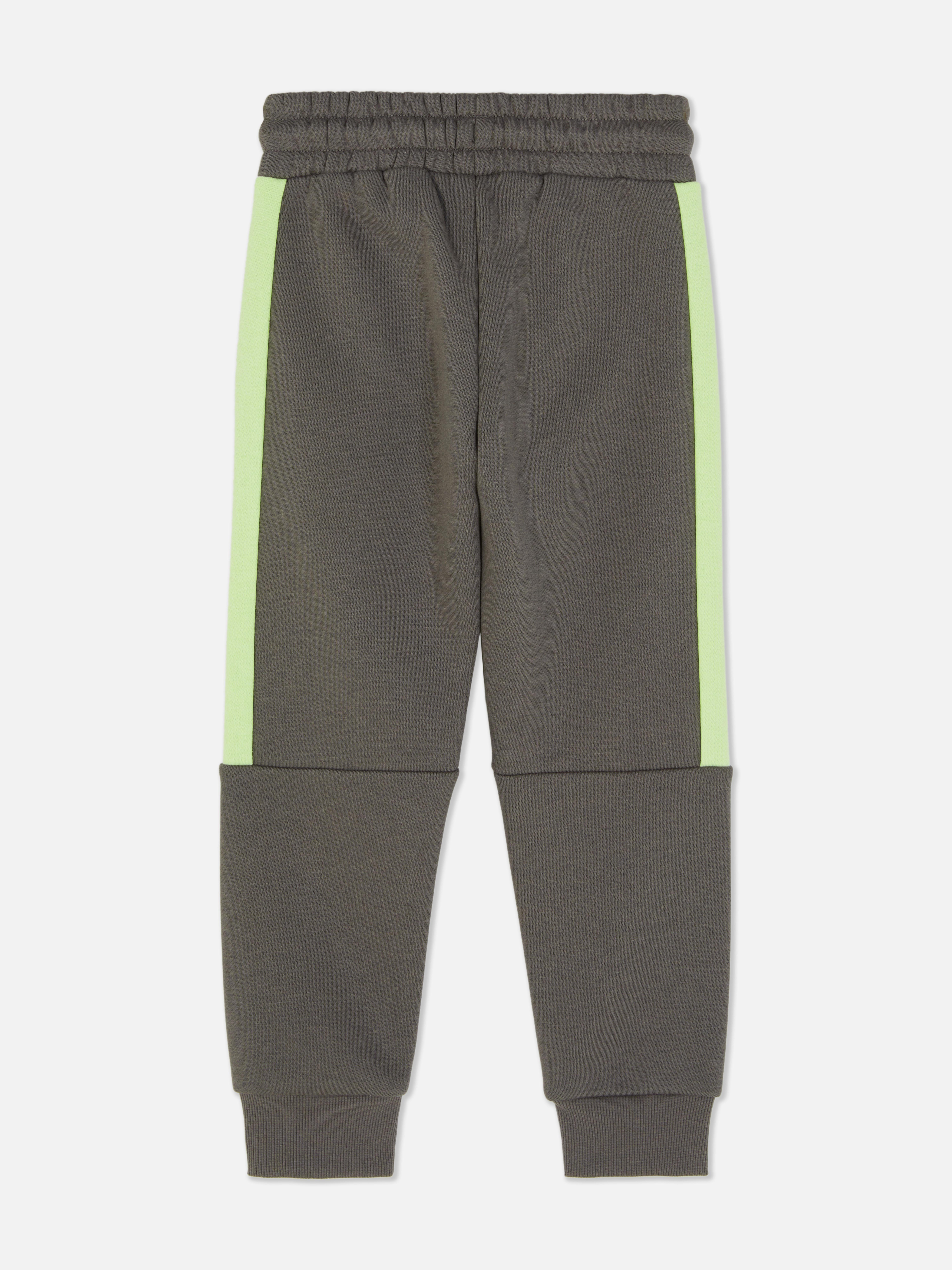 Pantaloni de trening asortați cu Super Mario Pantaloni de trening cu design Super Mario, șnur de strângere, buzunare și manșete la gleznă