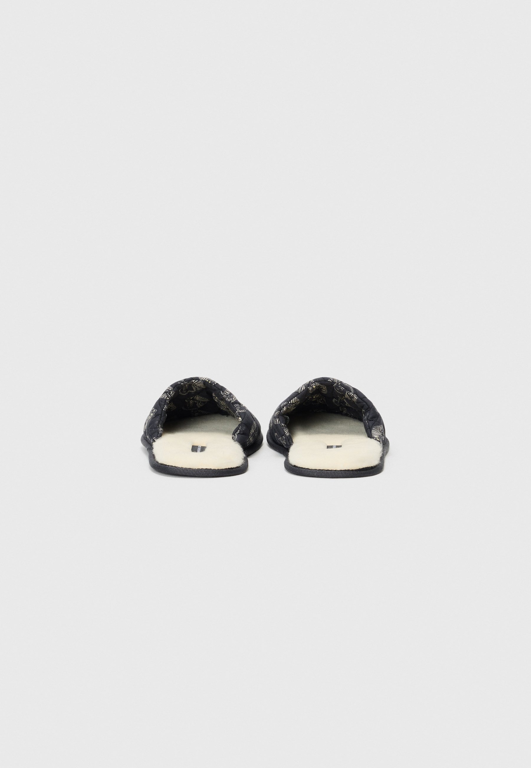 Desmond & Dempsey slippers - tijgerzwart/crème