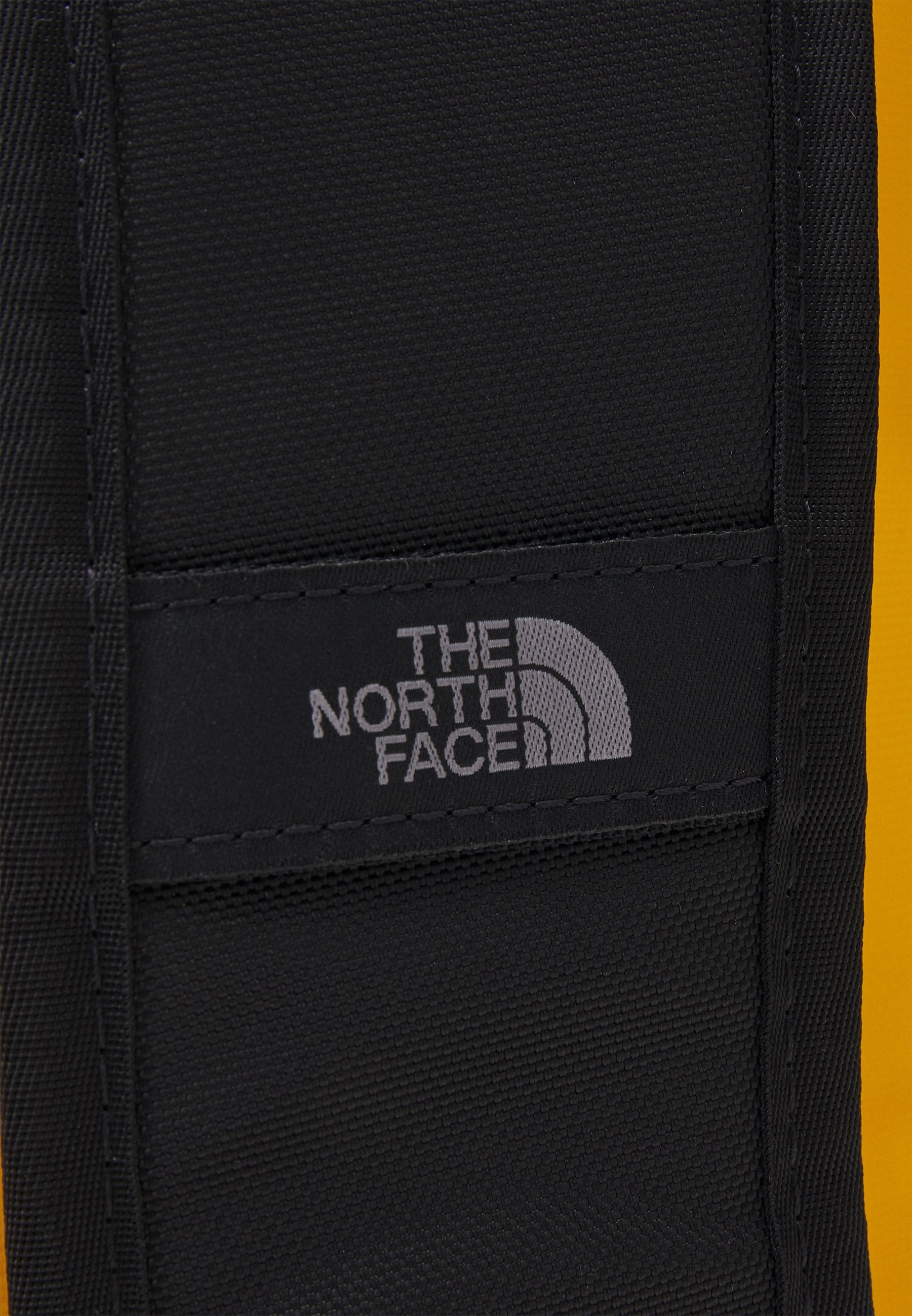 The North Face BASE CAMP DUFFEL - L - Reisetasche - Summit Gold/TNF Schwarz