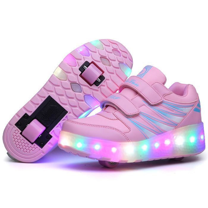 Zapatillas infantiles con ruedas y luces LED recargables por USB, color rosa.