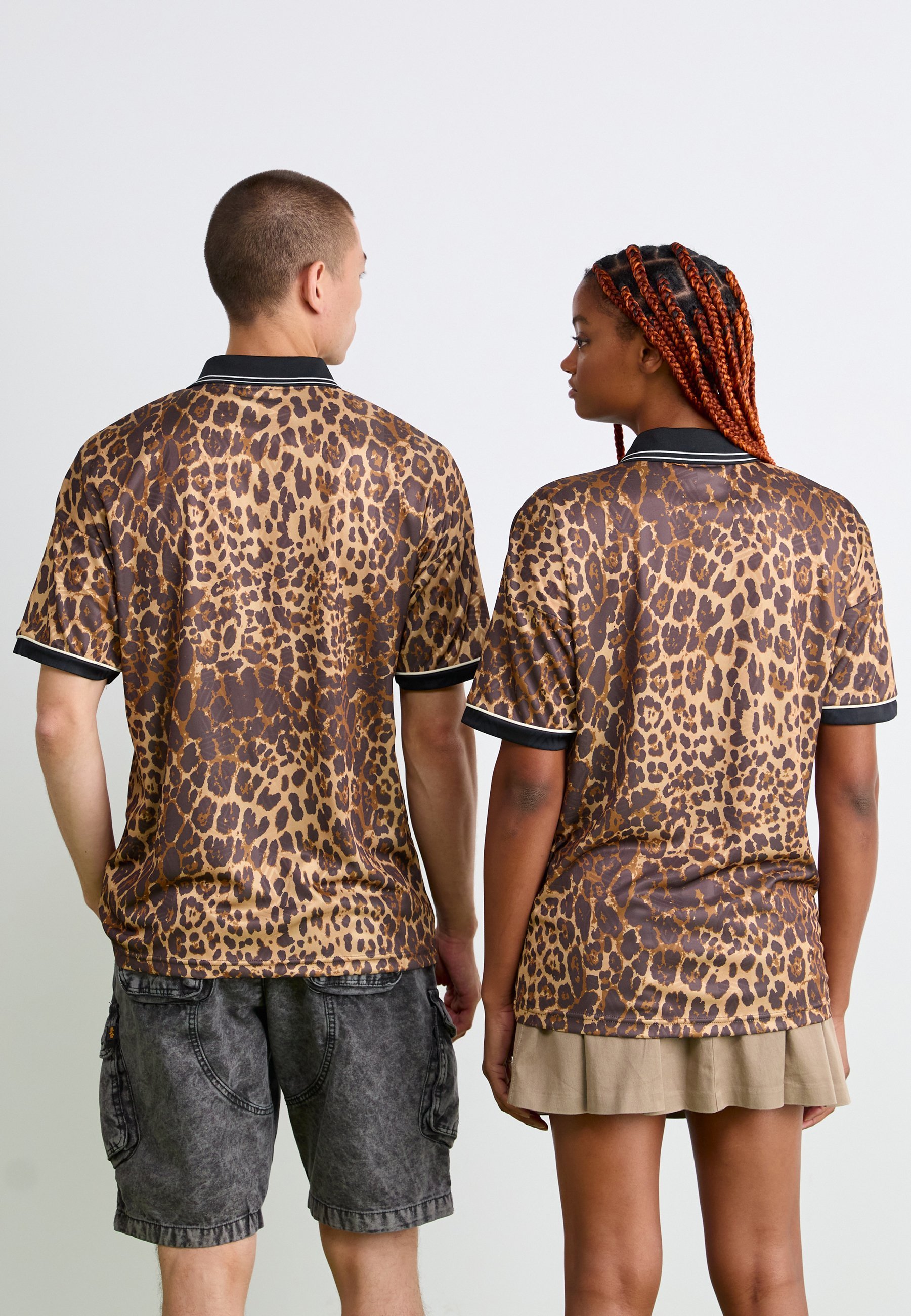 Umbro BOXY FUTBOLL UNISEX - Polo krekls - leoparda raksts/melns/brili balts