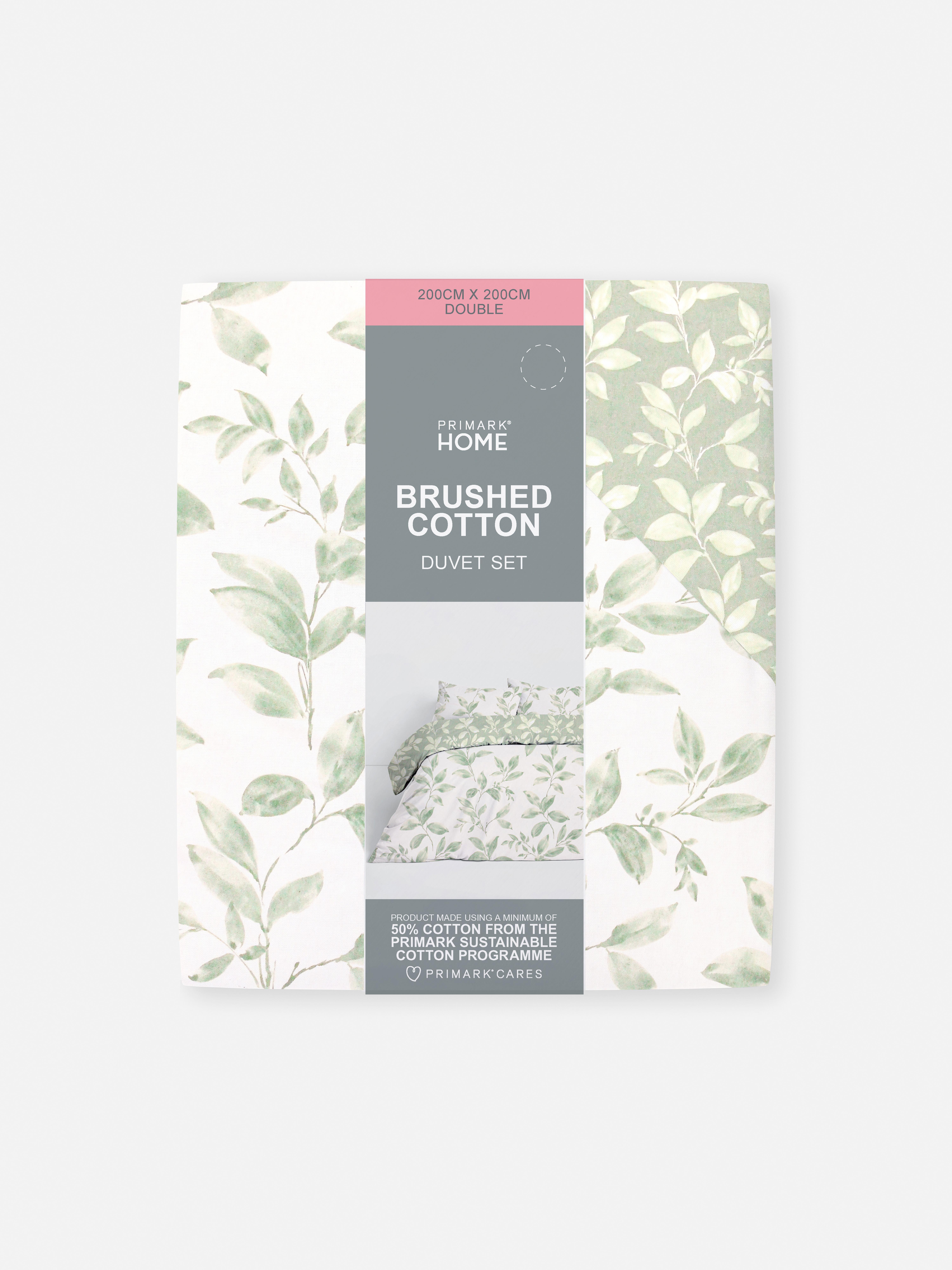 Set de husă de pilotă dublă reversibilă cu motiv de frunze. O husă de pilotă florală cu design reversibil.
