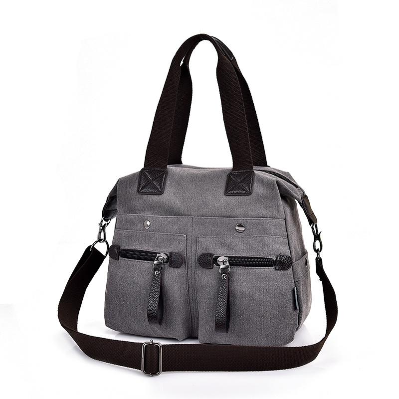 Sac bandoulière femme grande capacité en toile tendance 2020, souple et résistant, pour une utilisation polyvalente.