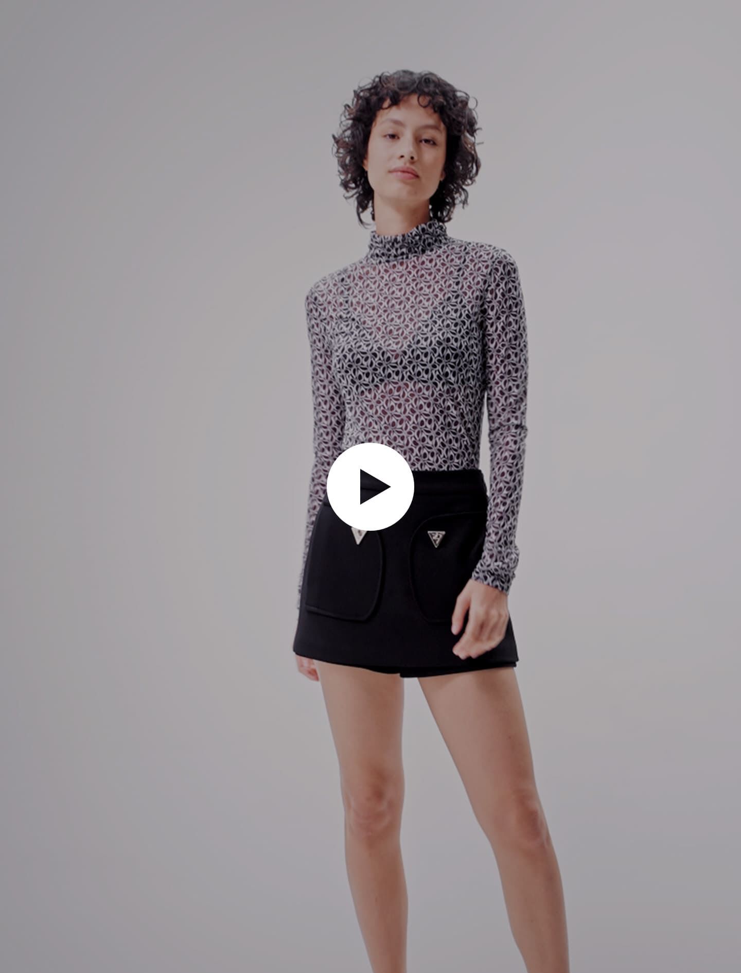 Semi-transparante top met patroon - Zwart/wit