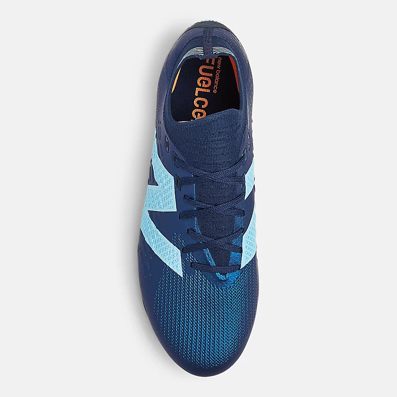 Zapatillas unisex TEKELA PRO LOW FG V4+ - NB Navy z Team Sky Blue i Hot Mango