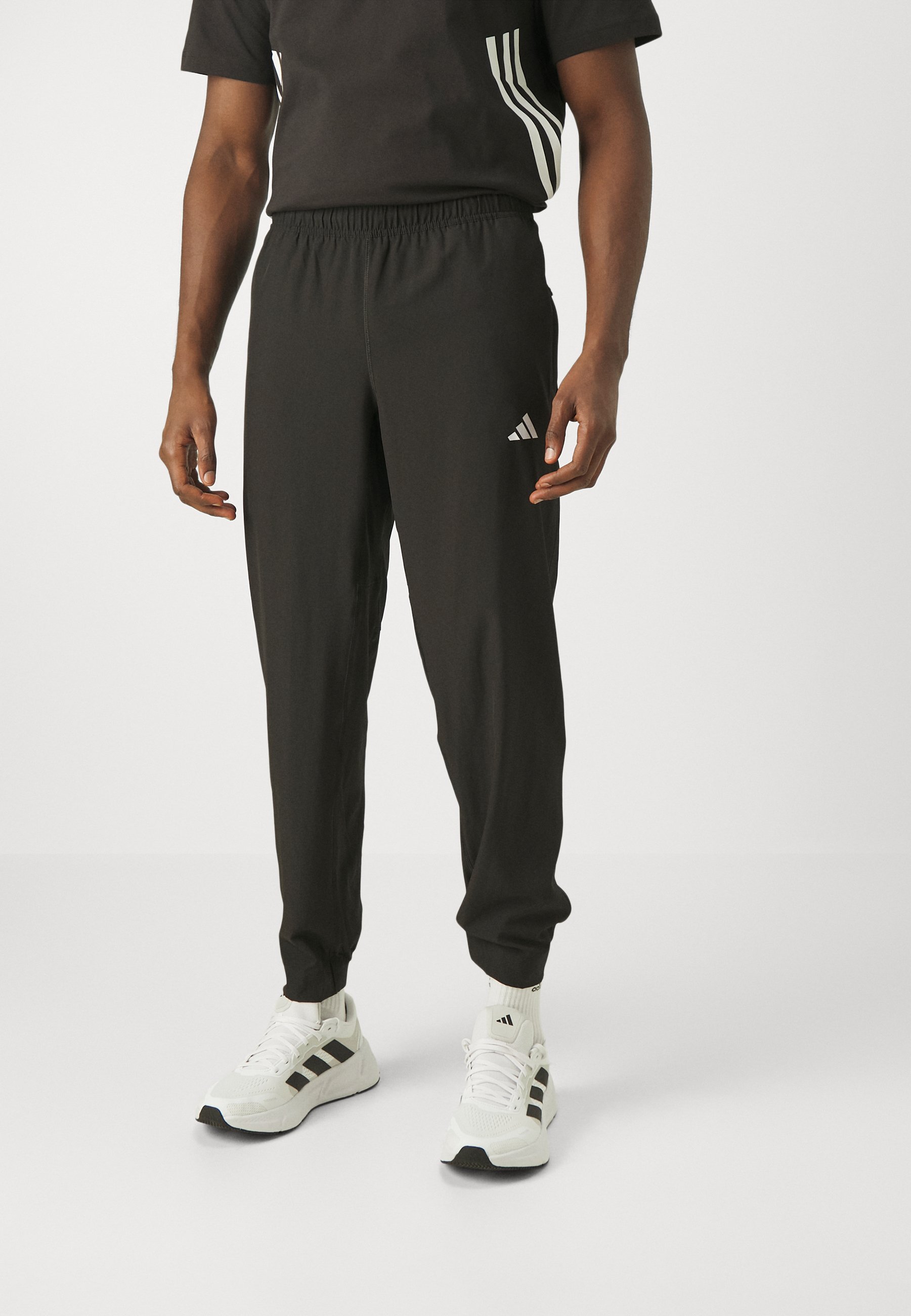 Pantalon de survêtement adidas Performance TRAIN ESSENTIALS - Noir/Blanc