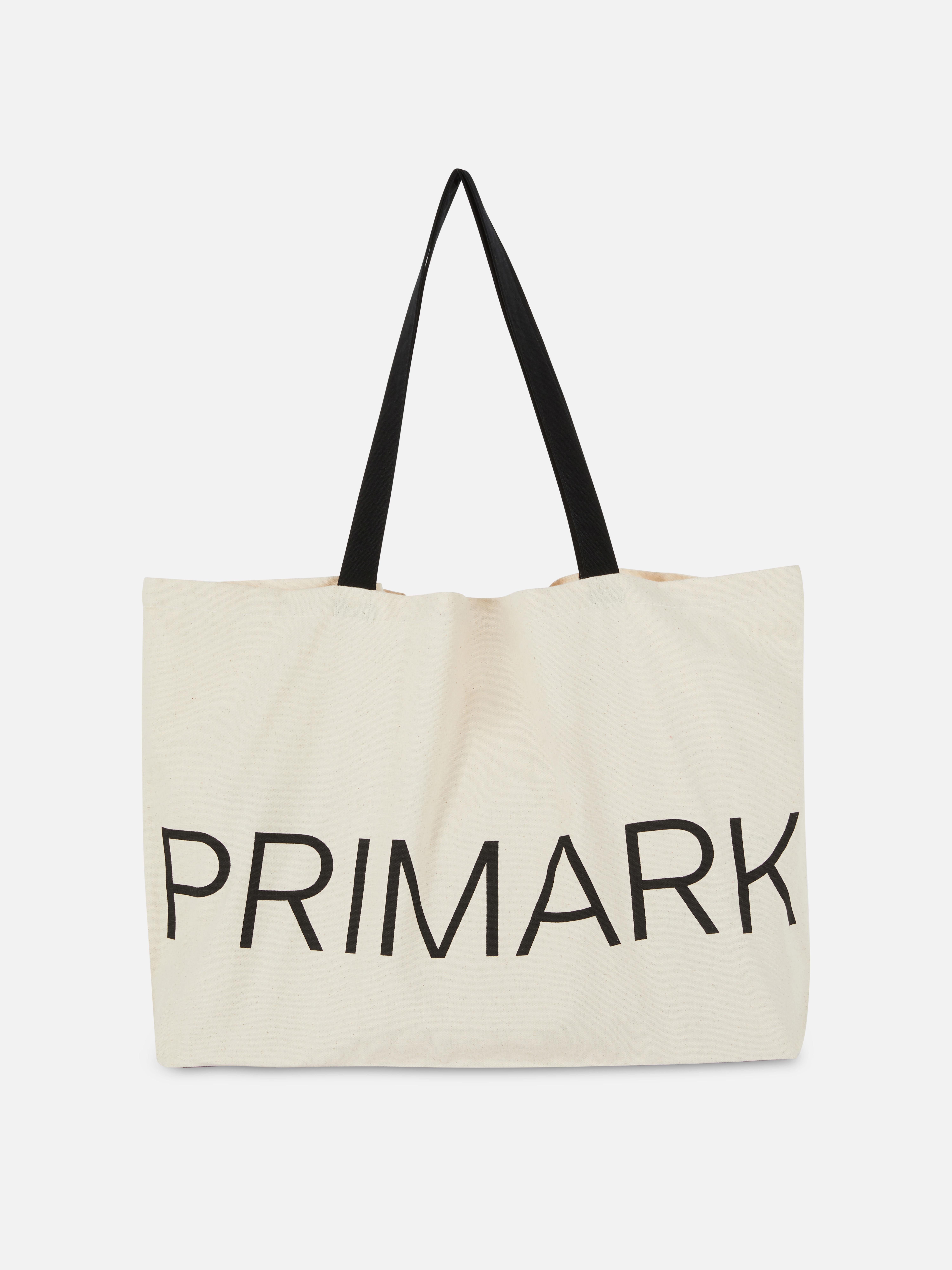 Geantă tote din pânză imprimată Primark. Geantă clasică din pânză, perfectă pentru o zi de cumpărături sau o scurtă treabă.