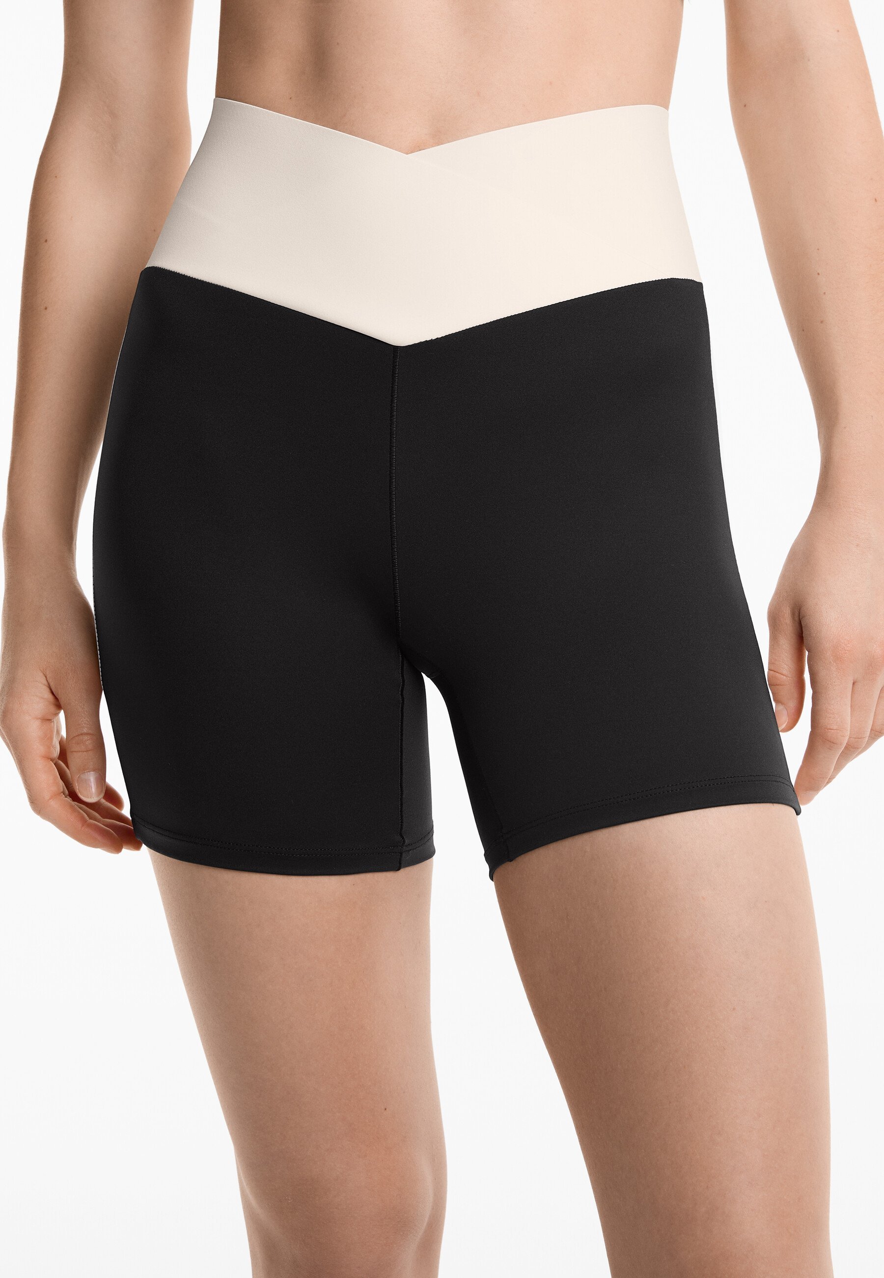 Legging taille haute OYSHO PERFECT-ADAPT 10 cm, coupe en V - Noir