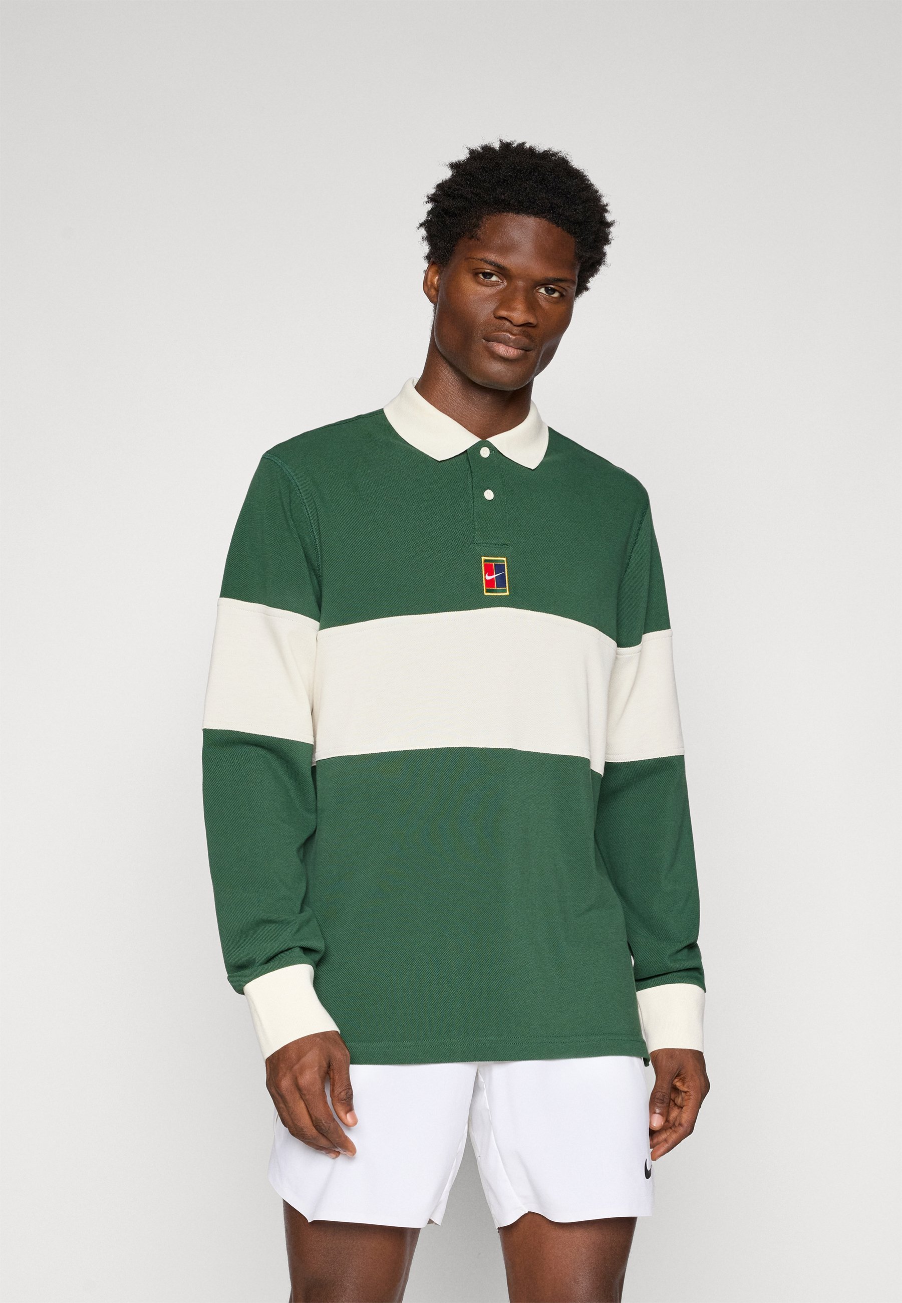 Nike Performance NIKECOURT HERITAGE - Polo - abete/avorio chiaro