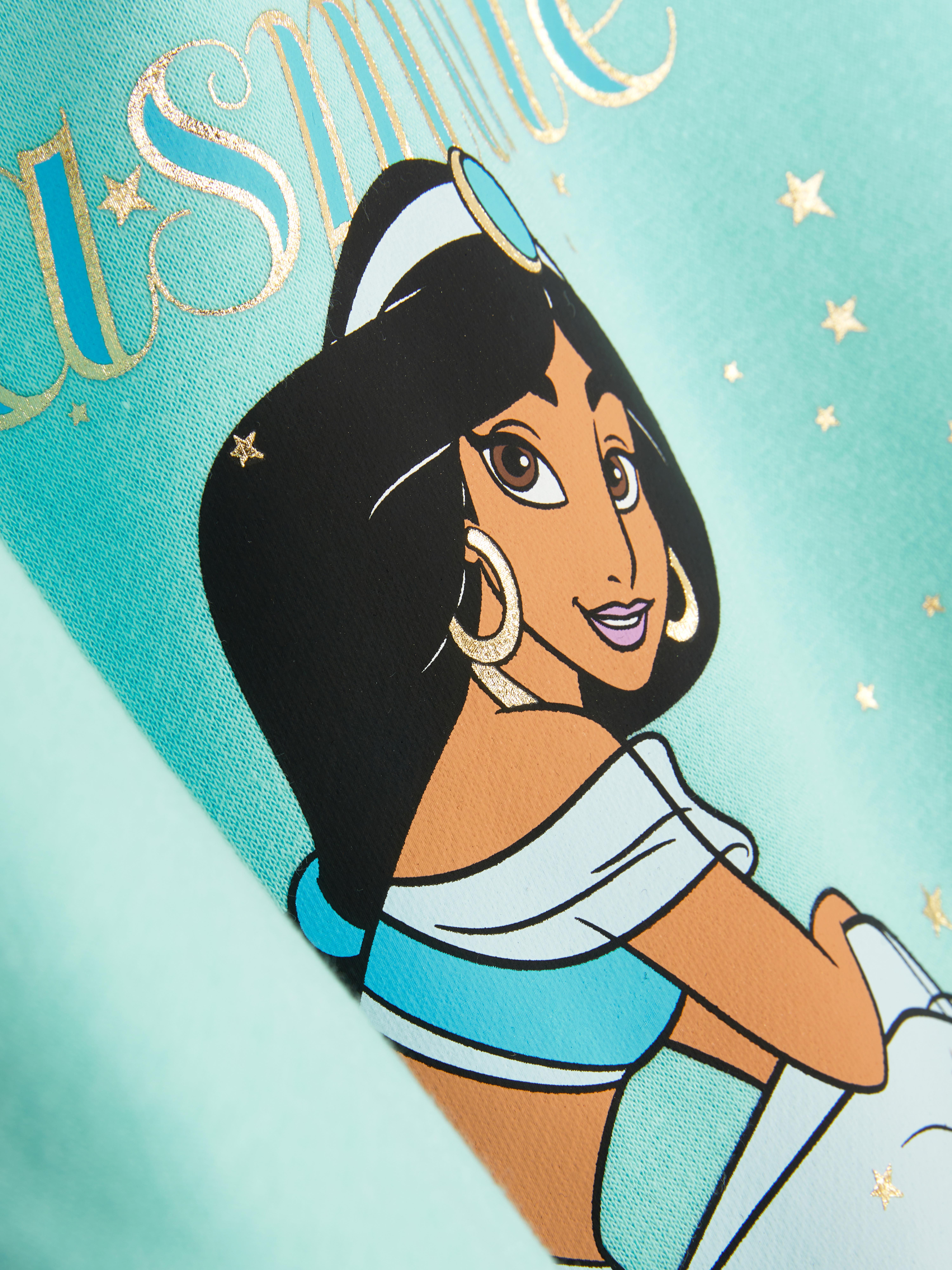 Hanorac cu imprimeu prințesa Jasmine de la Disney. Un hanorac cu umeri căzuți, manșete cu nervuri și imprimeu cu iasomie.