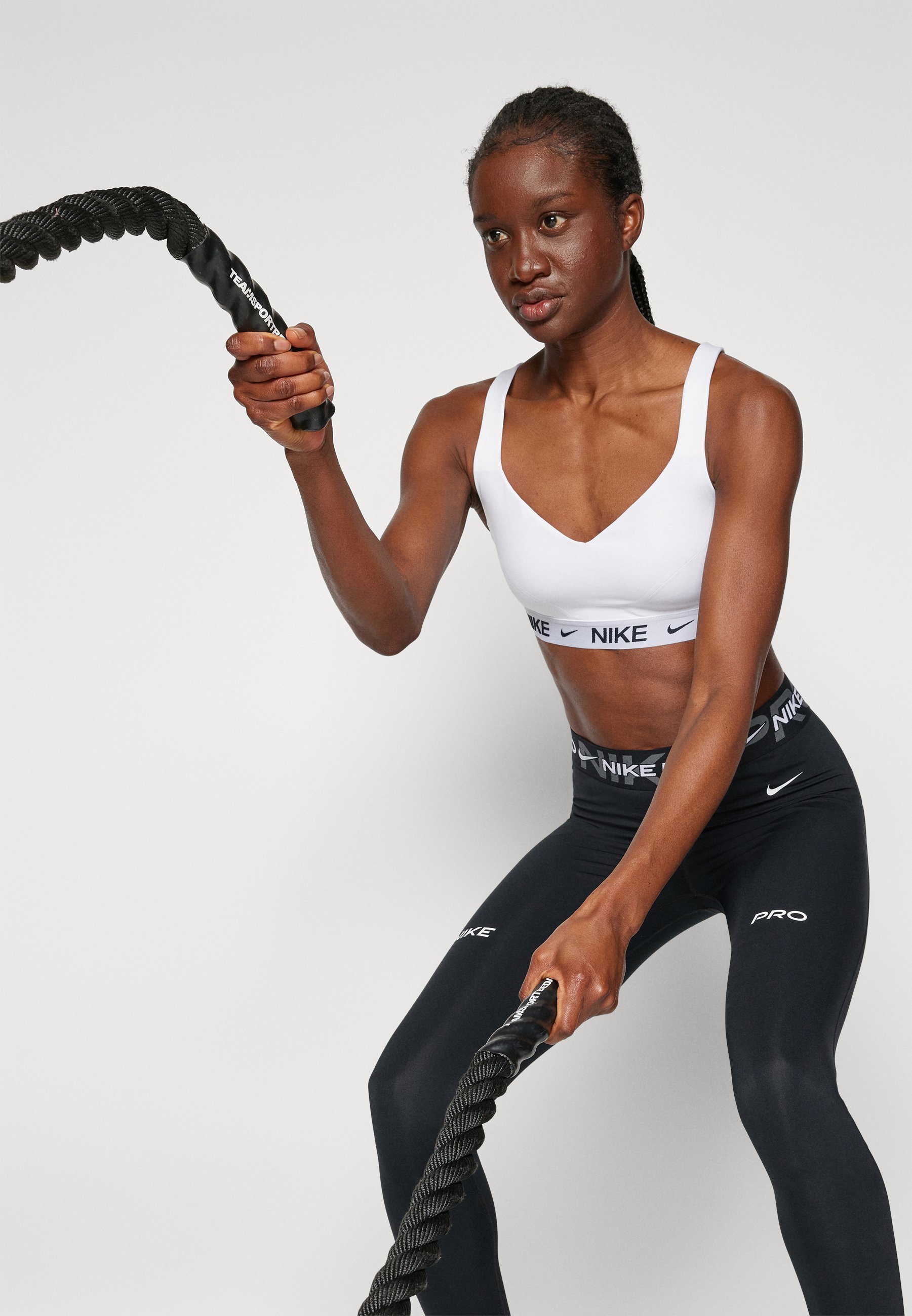 Reggiseno sportivo Nike Performance INDY BRA ad alto sostegno - bianco pietra malva nero