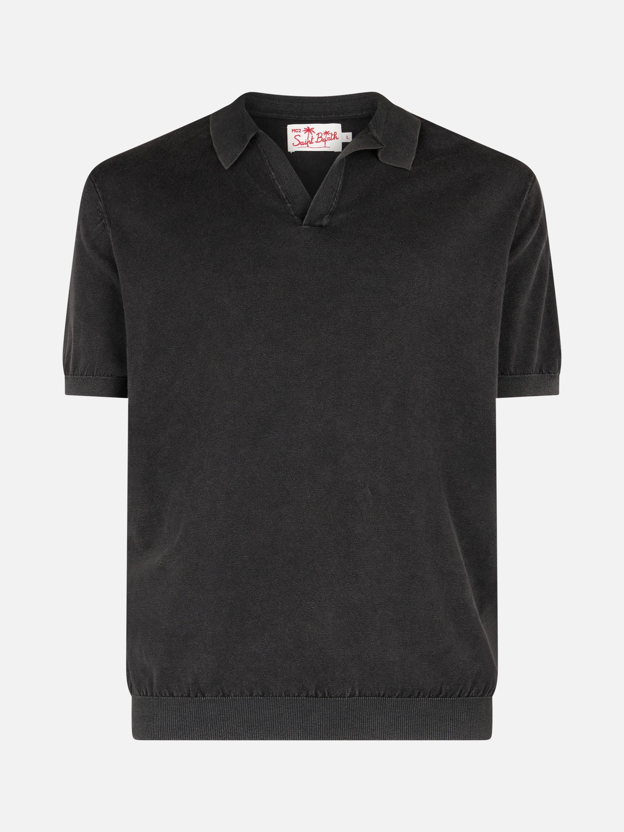 Sloan poloshirt in zwart gebreid met knoopsluiting en vintage afwerking.