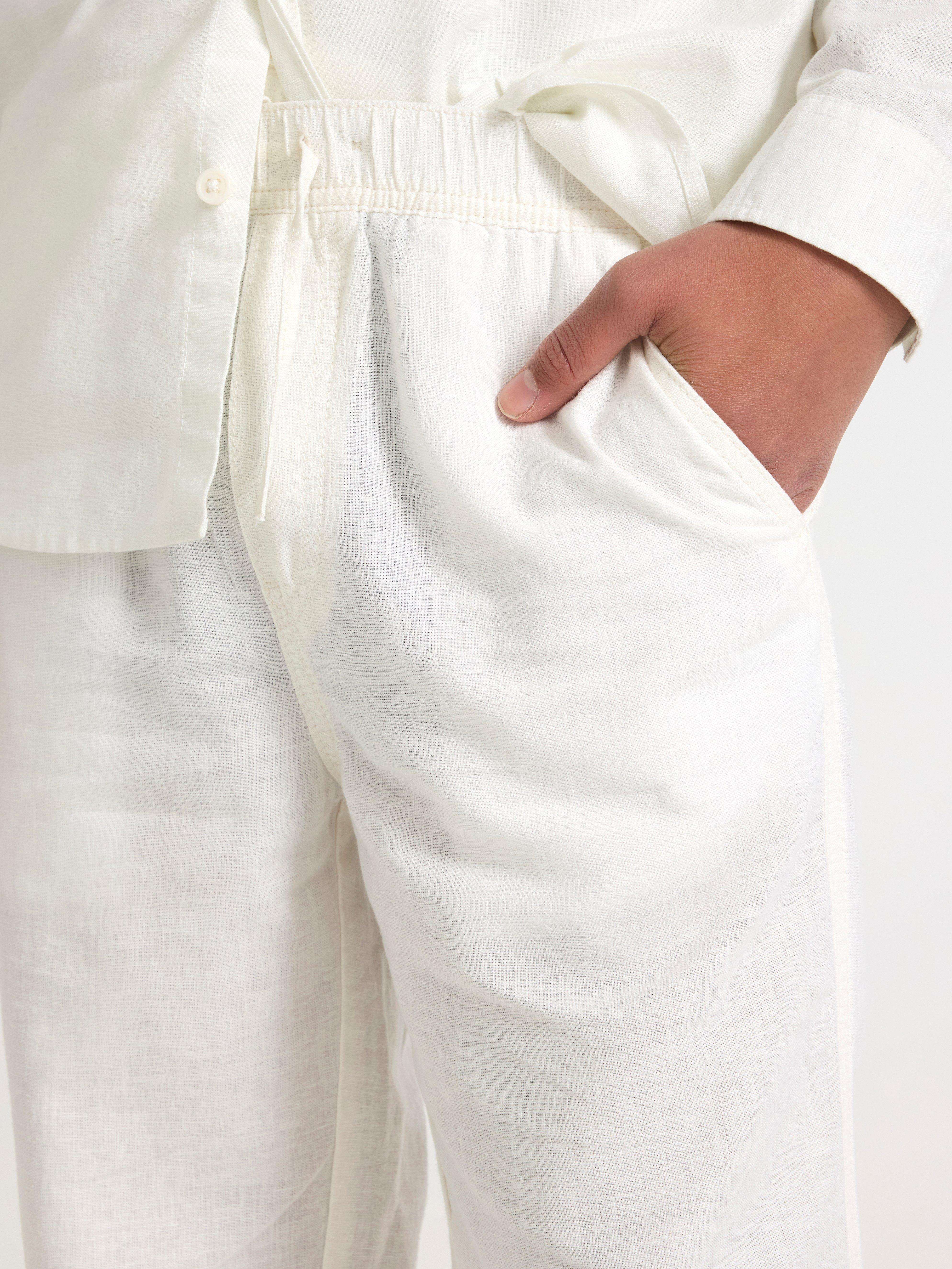 Pantalones rectos STAFFAN de mezcla de lino, color blanco roto.