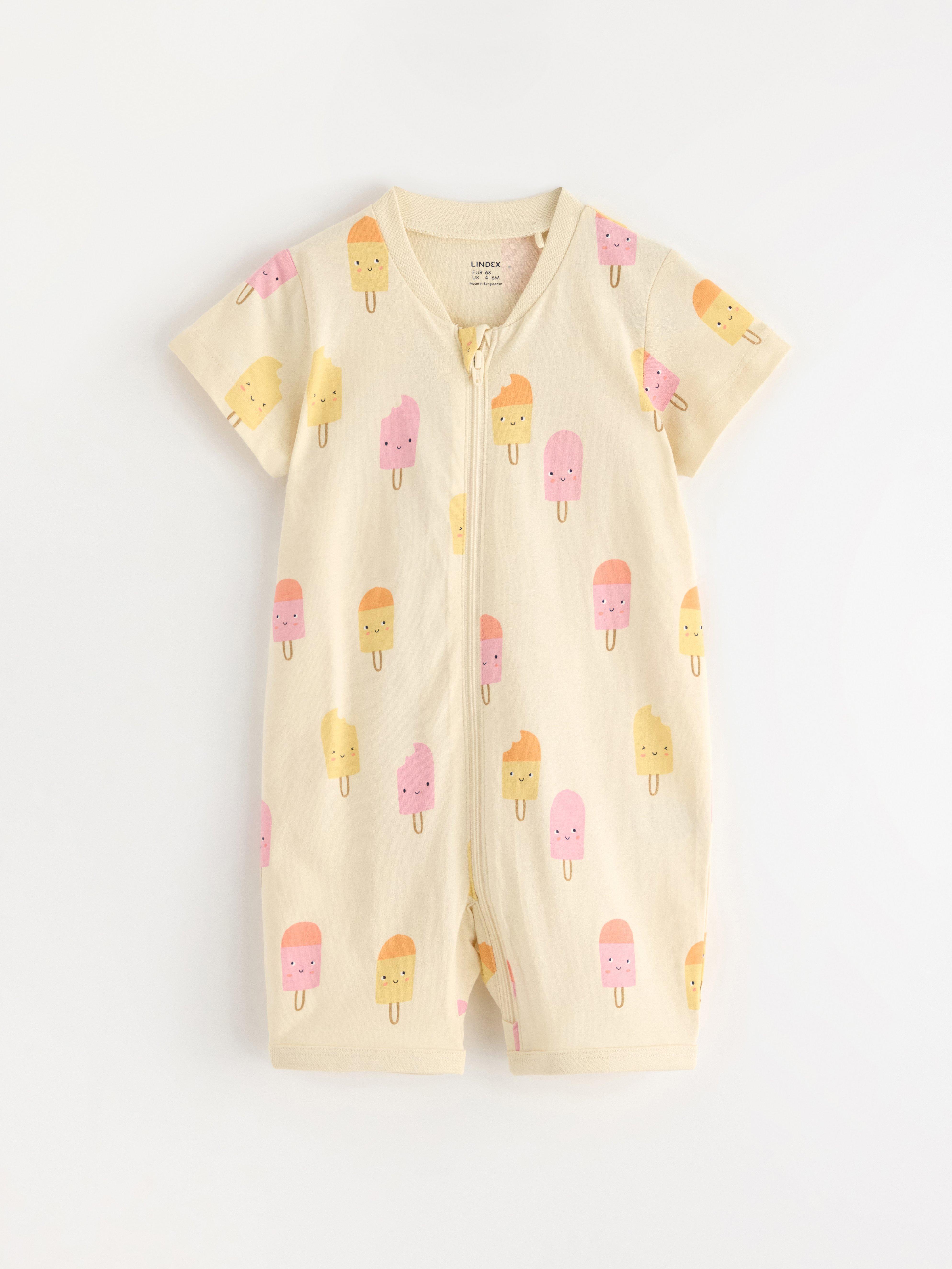 Macacão de pijama amarelo claro acinzentado