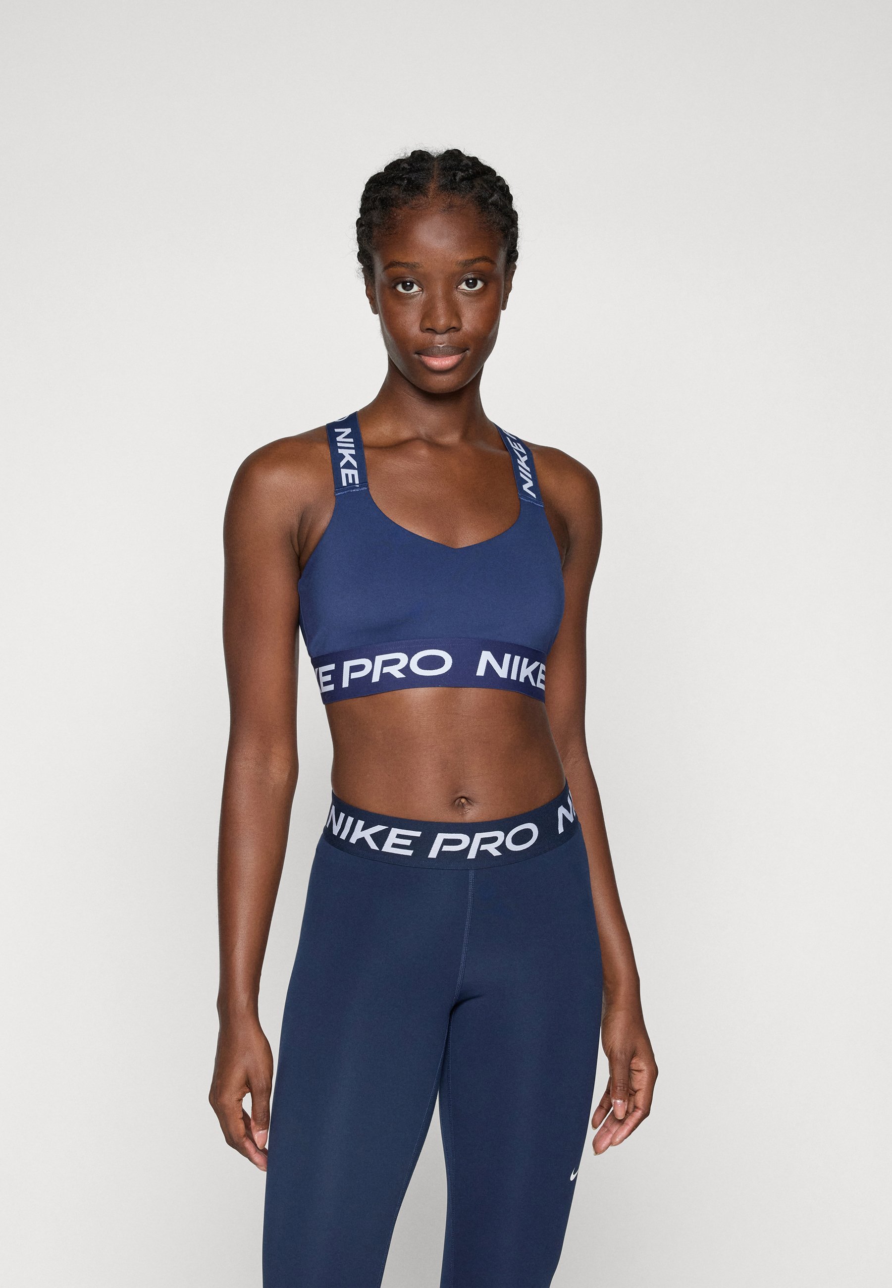 Soutien-gorge de sport Nike Performance - Maintien léger - Bleu marine/Blanc