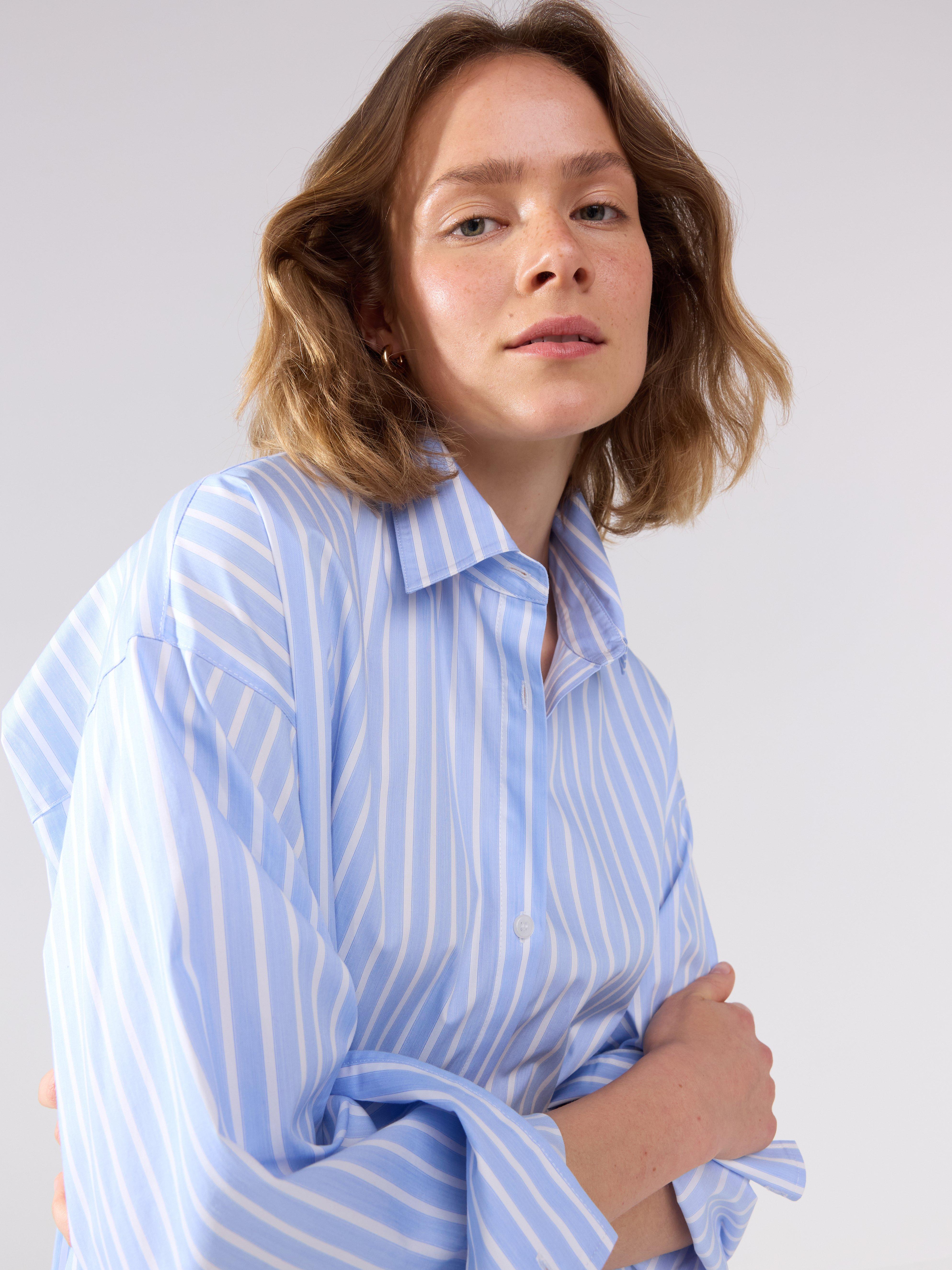 Camisa comprida azul claro