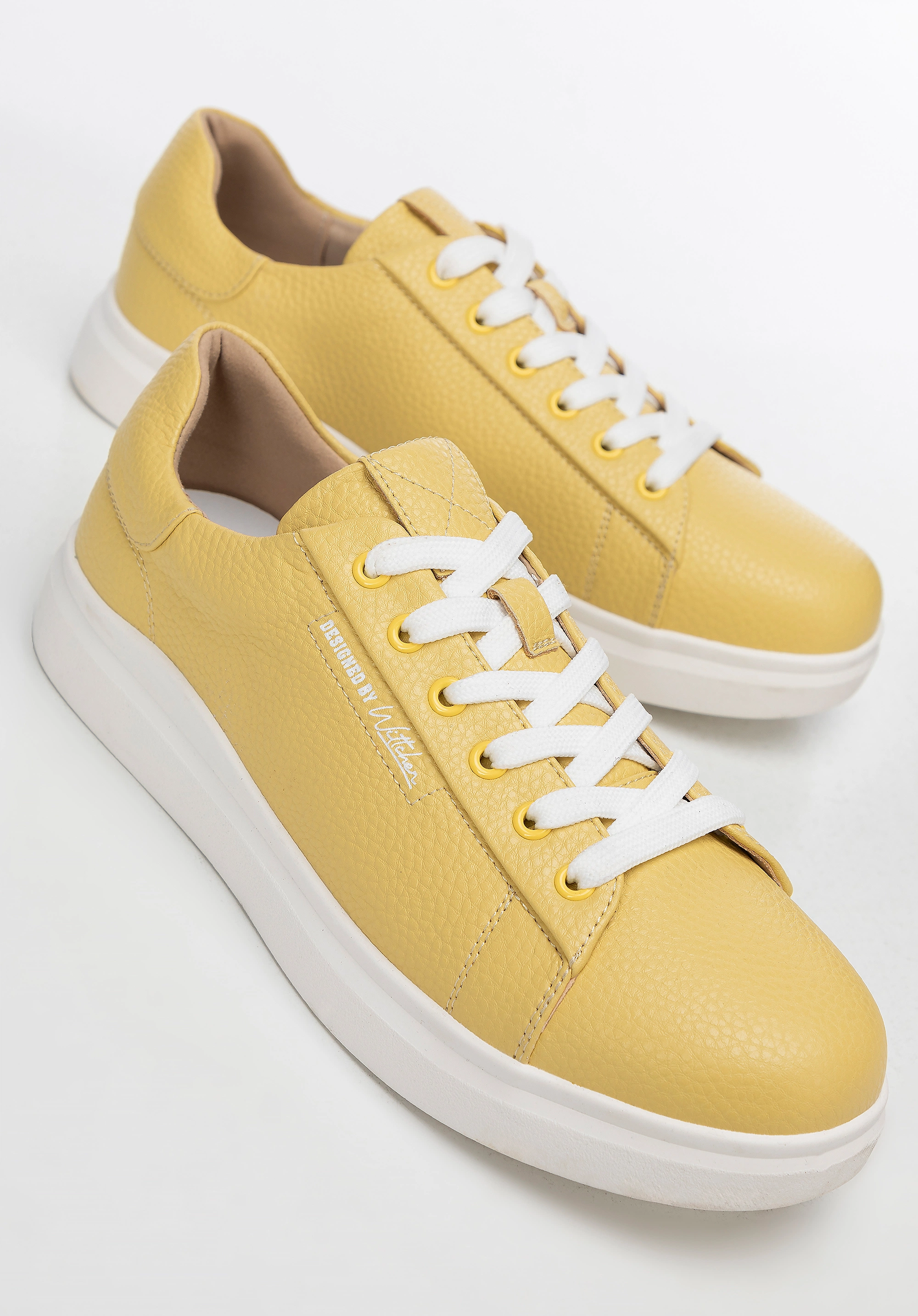 Damskie klasyczne sneakersy na platformie żółte