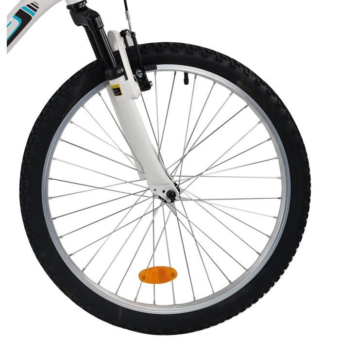 Vélo VTT 24'' Tout Suspendu équipé de 18 vitesses via un dérailleur Shimano, de Freins V-Brake et de Jantes en Aluminium