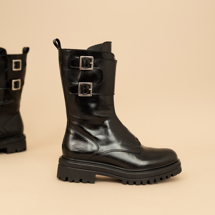 Boots à fermetures frontales et boucles latérales  en cuir noir