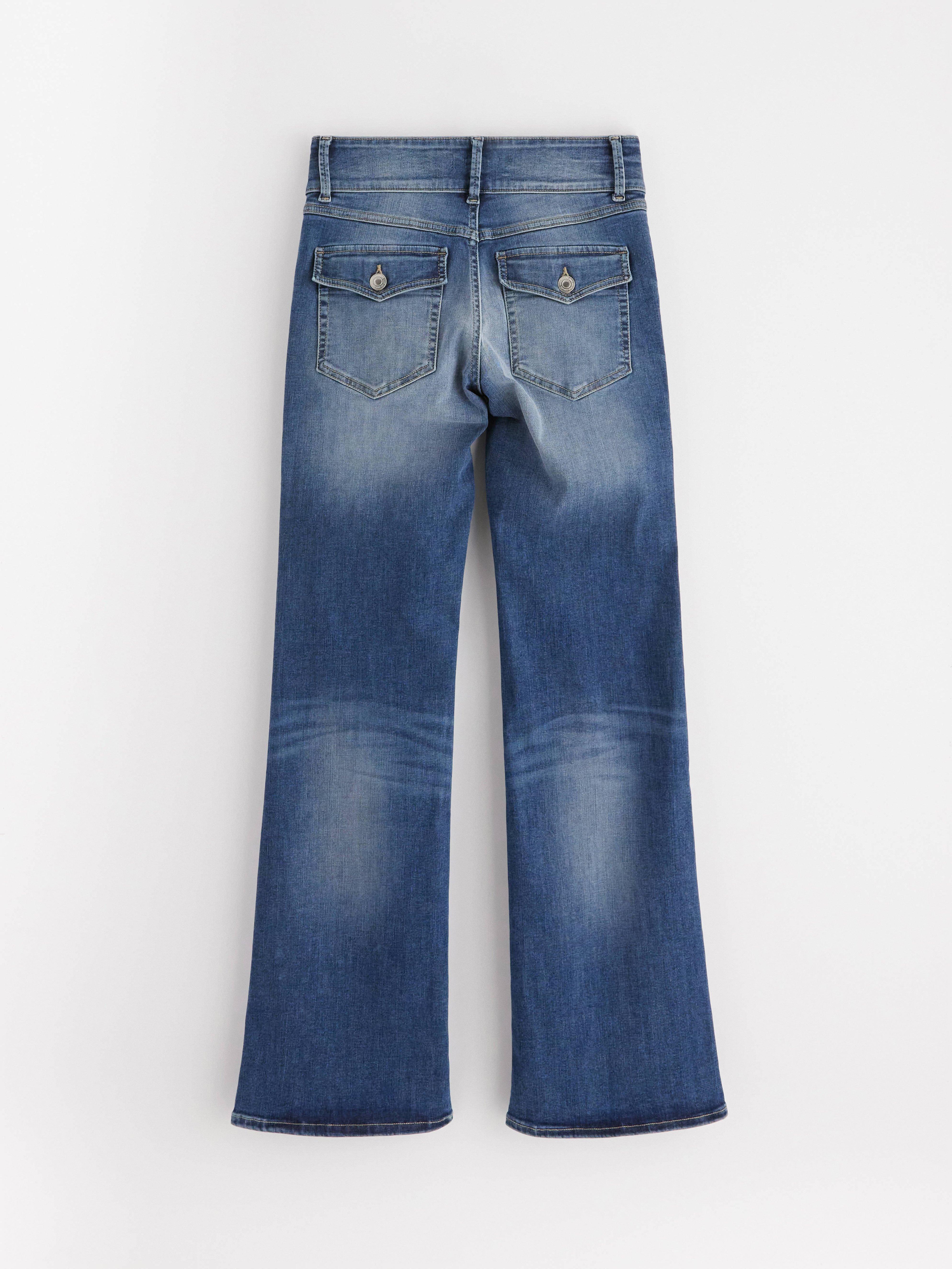 Pantalones vaqueros elásticos FLARE de talle bajo color azul vaquero