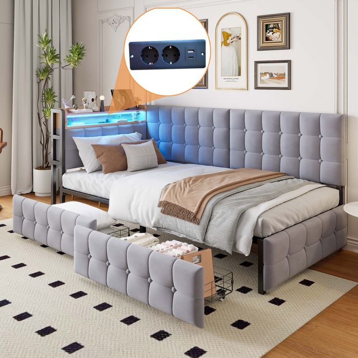 Divano letto trasformabile imbottito di colore grigio con illuminazione a LED, cassetti e porte USB/Type-C.