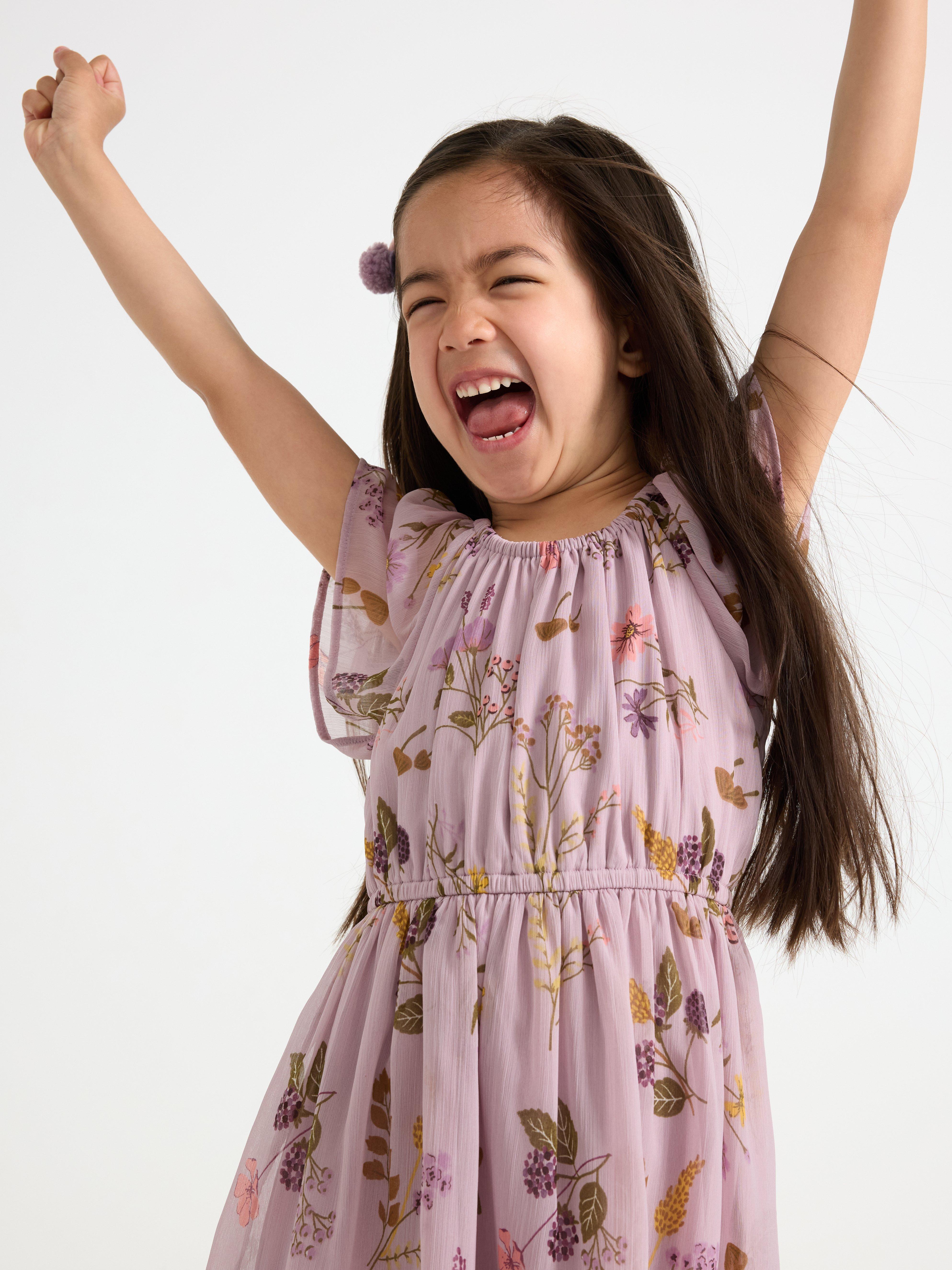 Robe en mousseline lilas clair poudré
