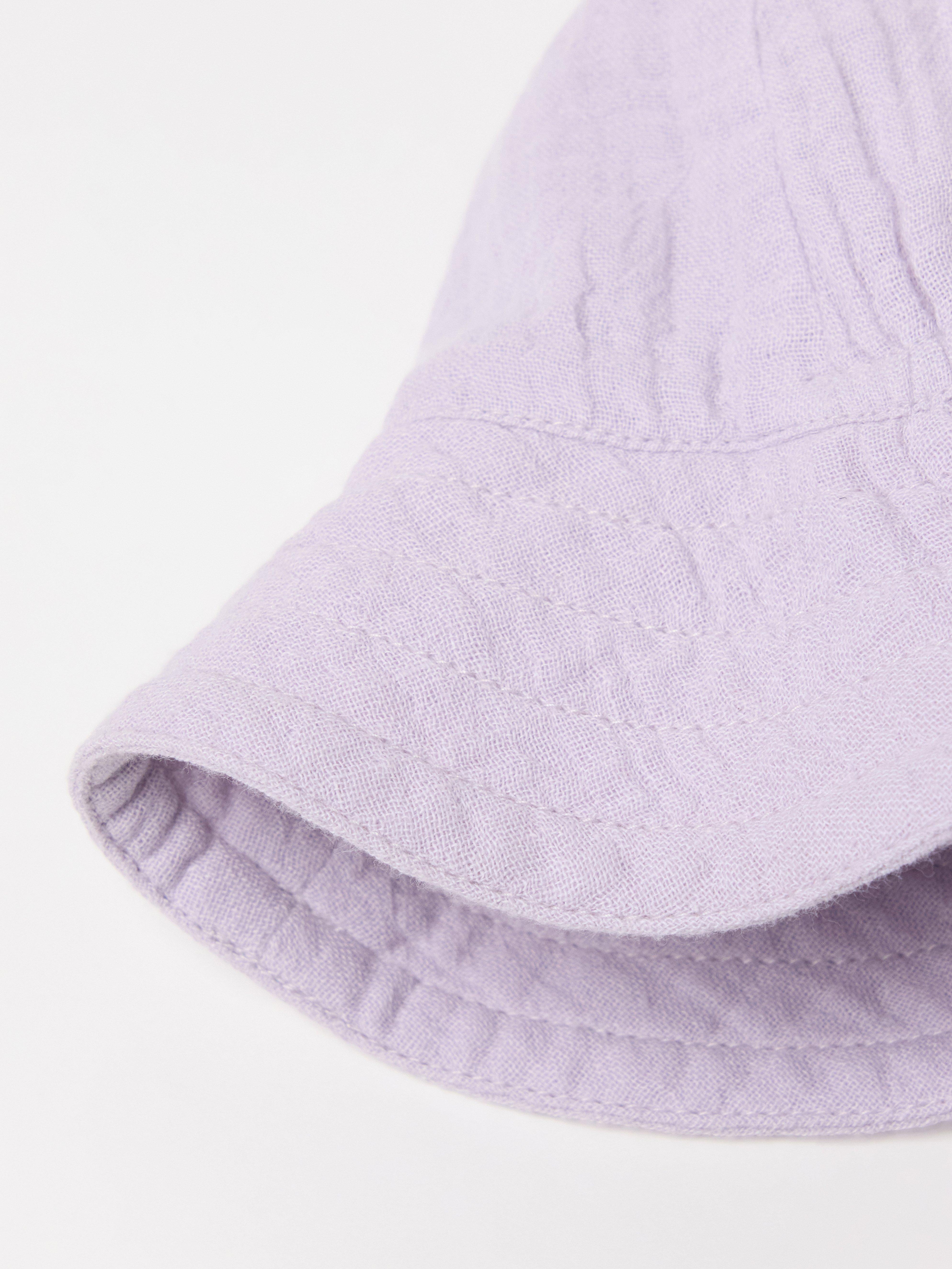 Chapeau de soleil en coton, couleur lilas clair.