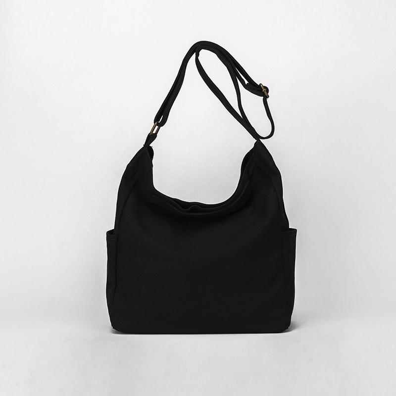 Sac bandoulière décontracté en toile pour femme, style japonais décontracté, simple et sauvage, grande capacité.