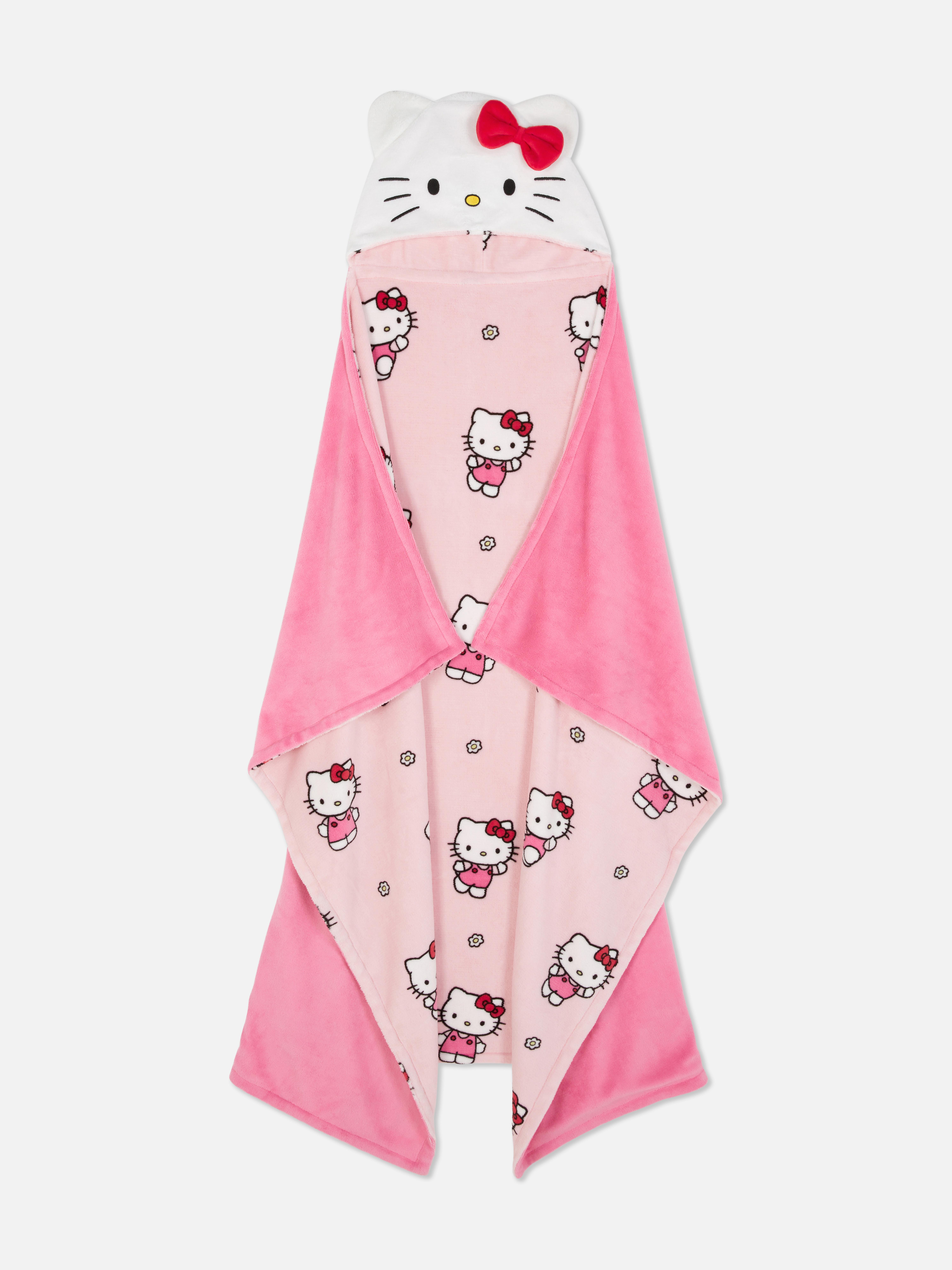 Pătură cu glugă Hello Kitty Înfășoară-te în această pătură cu glugă Hello Kitty pentru mai multă căldură