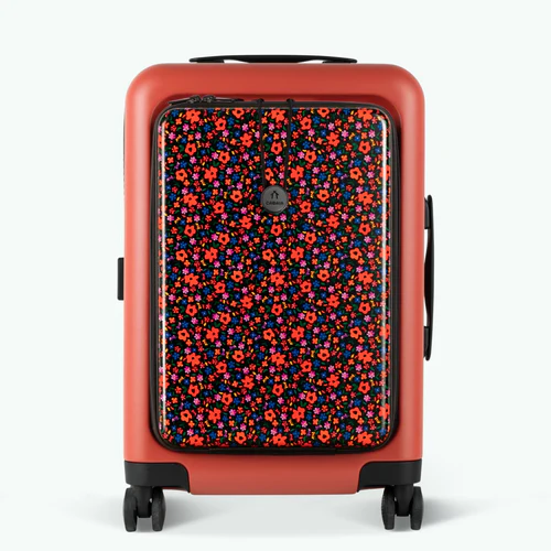 Cabaia LHR-Hartschalenkoffer mit 4 Rollen und orangefarbener MAD-Tasche