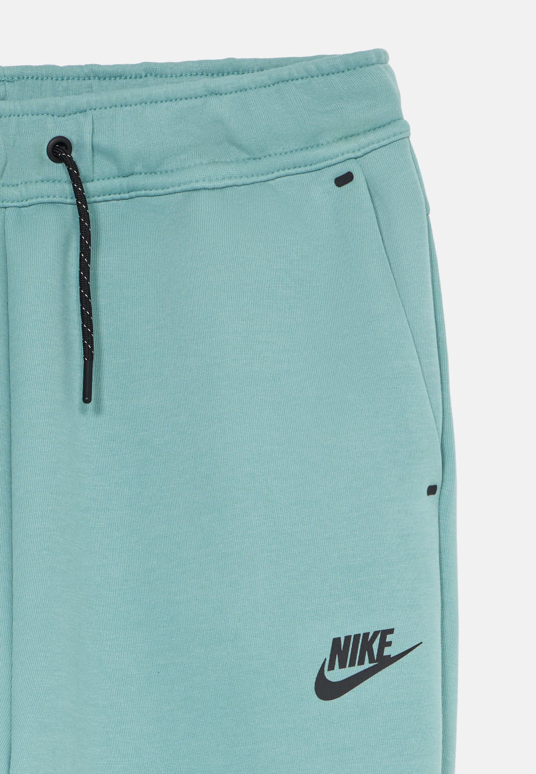 Nike Sportswear TECH UNISEX - Spodnie dresowe - armata/czarne