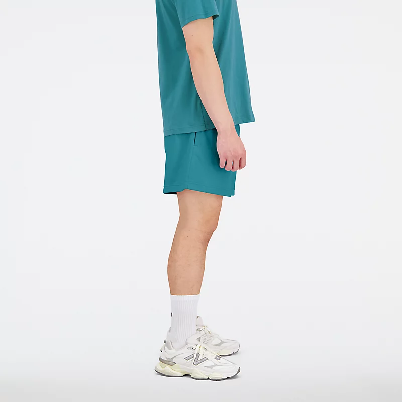 Shorts Unissex Uni-ssentials em tecido atoalhado na cor verde-azulado vintage.