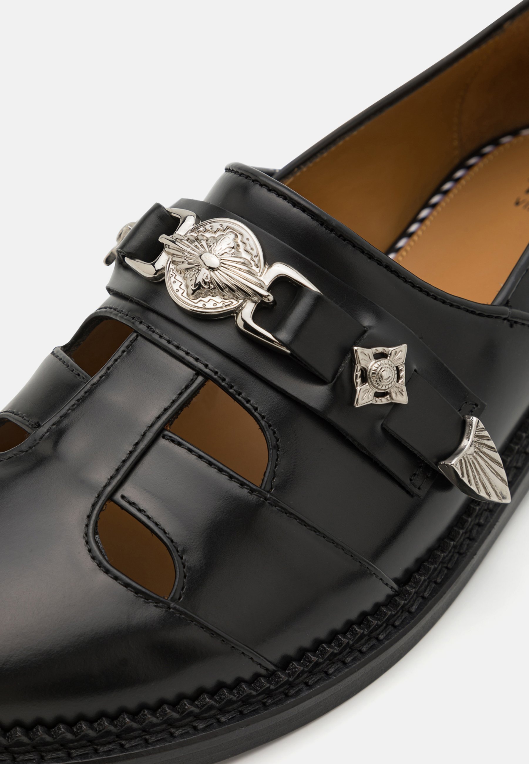 Toga Slip-ons - svart