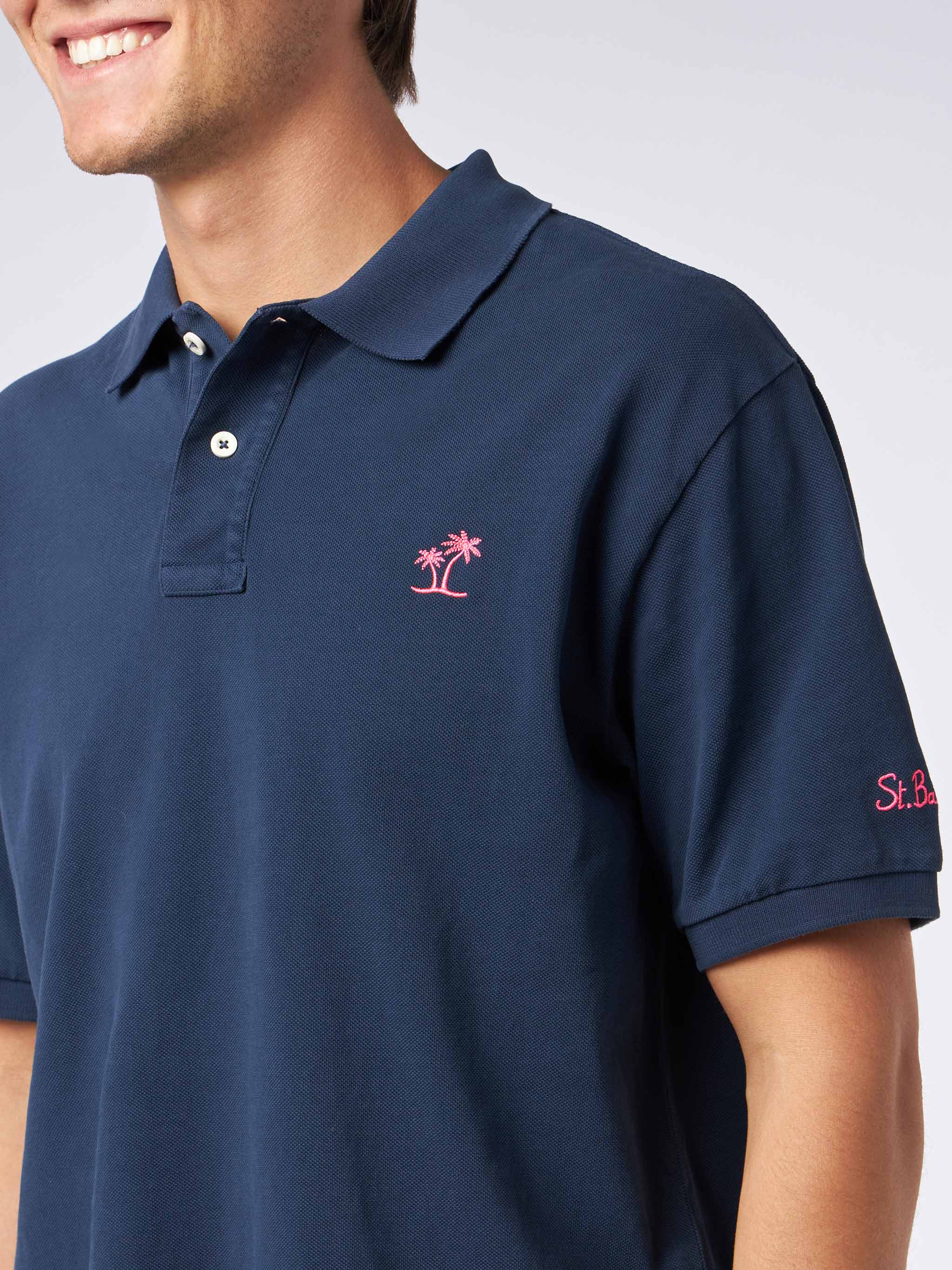 Herenpolo in blauw piqué met St. Barth-logo en vintage-effect.