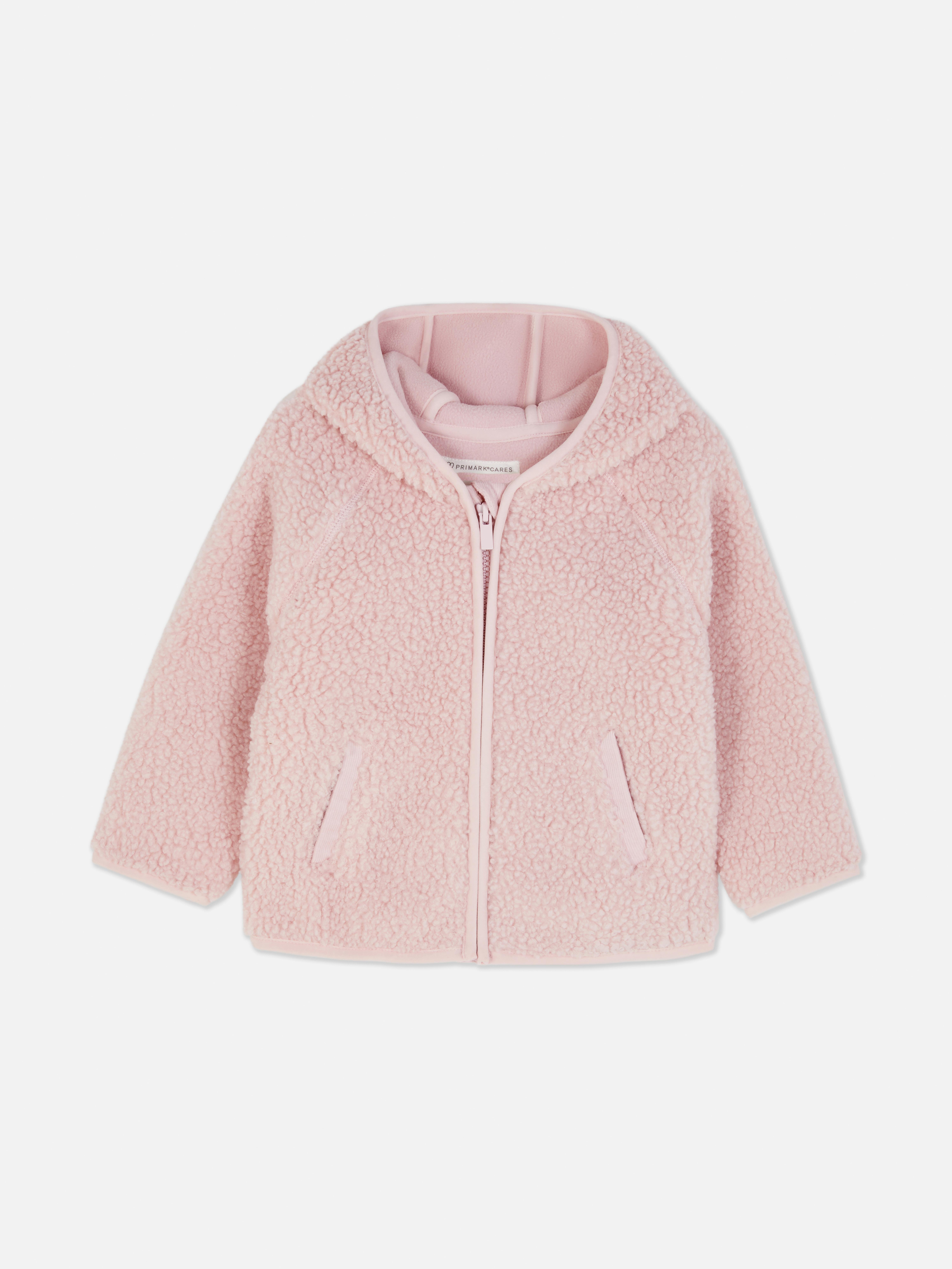 Haină din fleece cu glugă O haină din fleece cu glugă și buzunare laterale